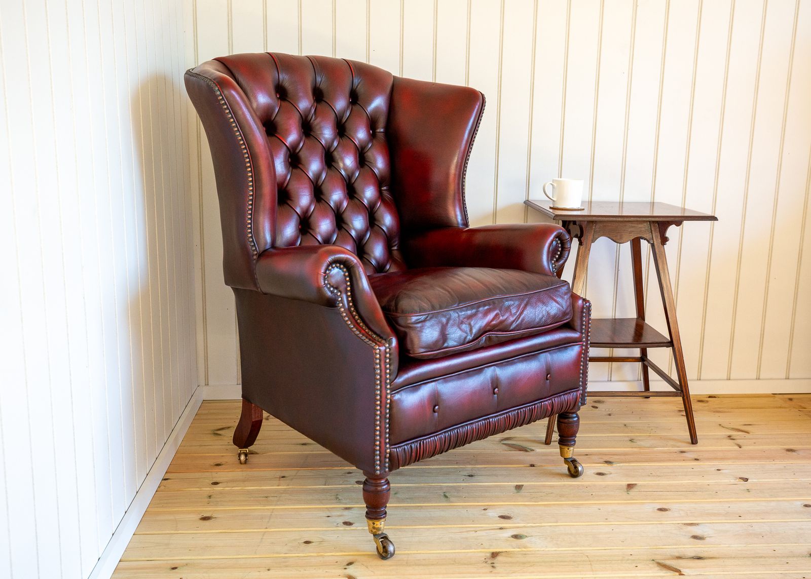 photo for sale Harrods Wingback Chesterfield Armchair Georgian Style Oxblood Red 1990s Casters Fireside Chair Fine Country House