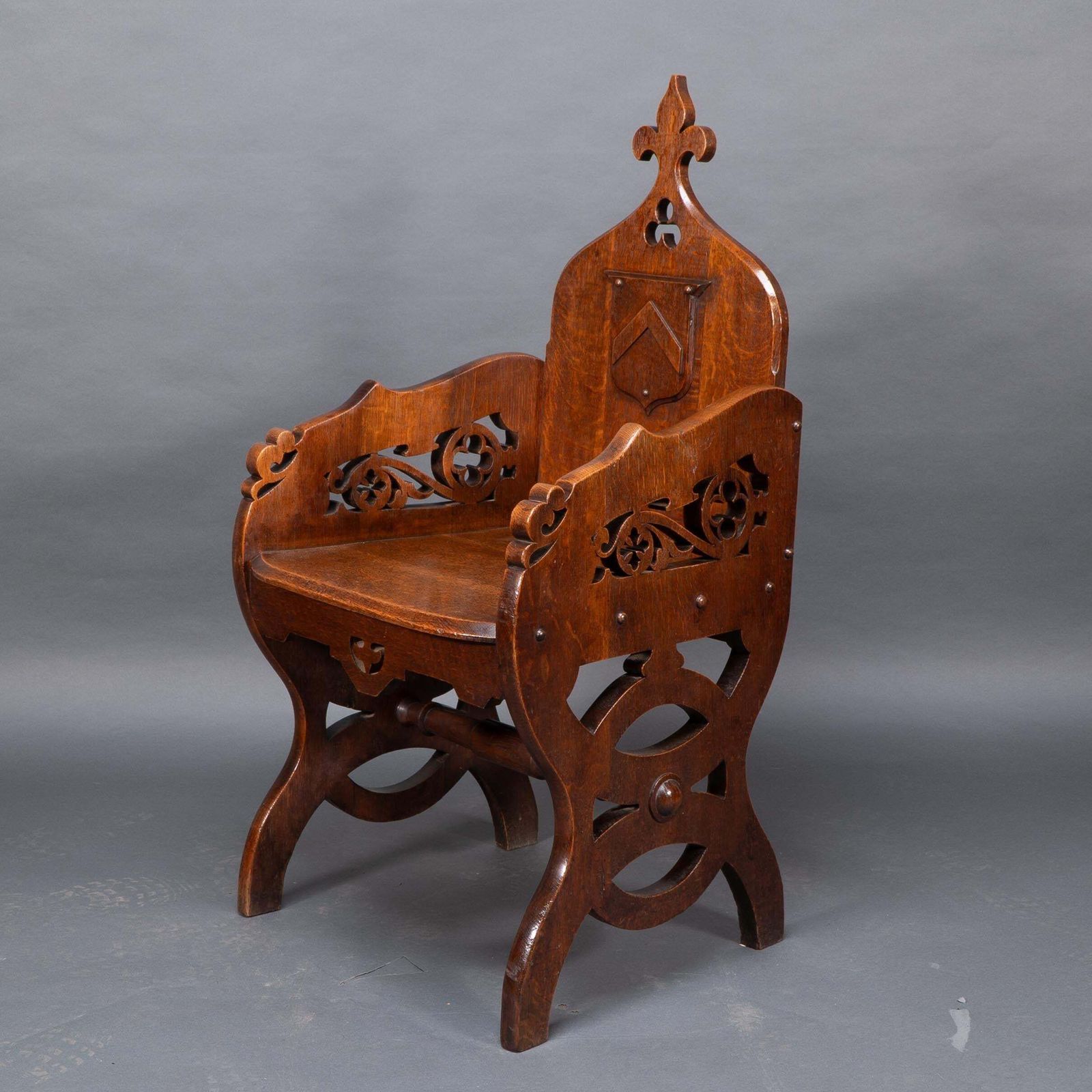 A High Gothic Revival Oak Armchair With Carved And Fretwork Sides photo for sale