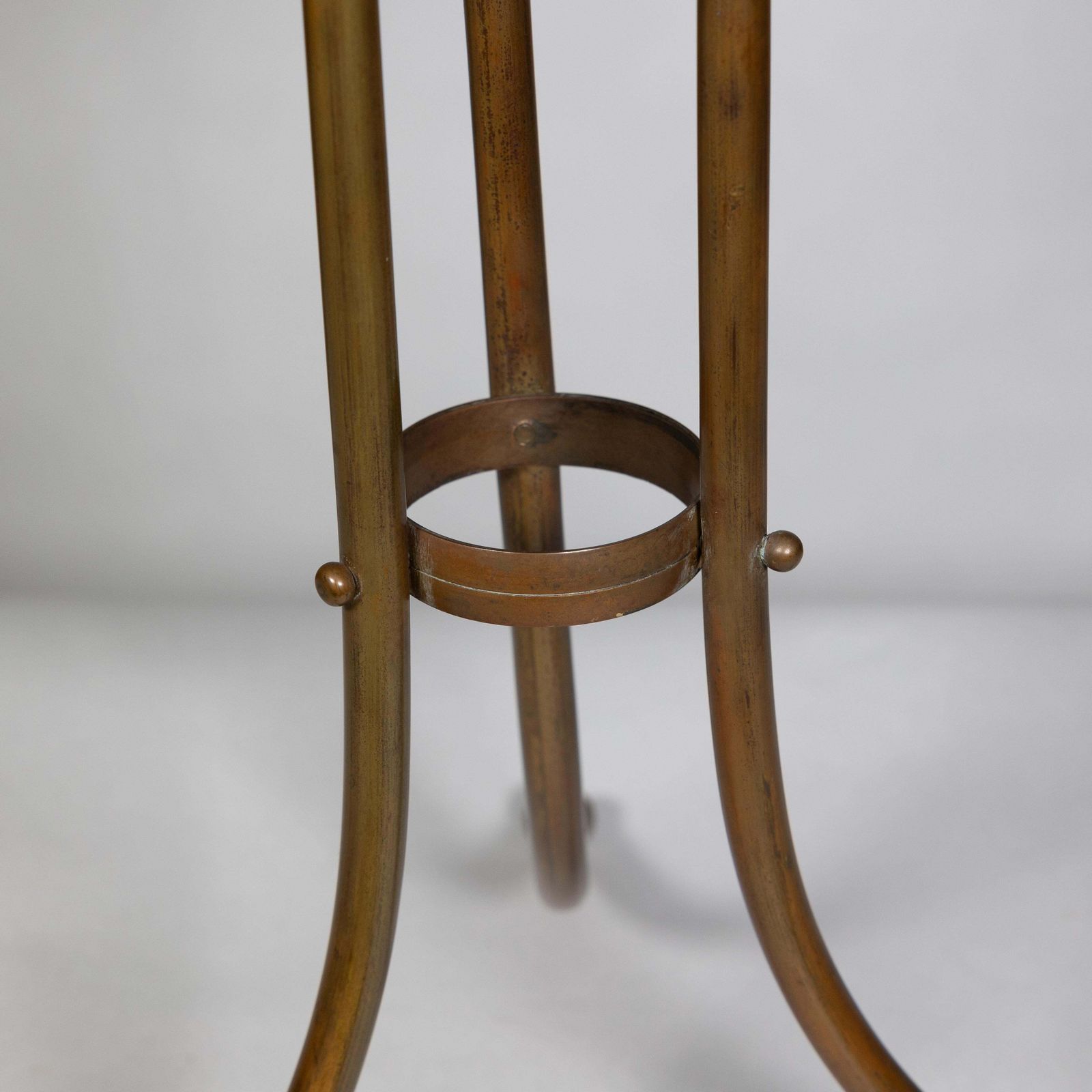 765.0 Townshends Brassfounders. An Arts & Crafts Revolving Tripod Magazine Rack photo