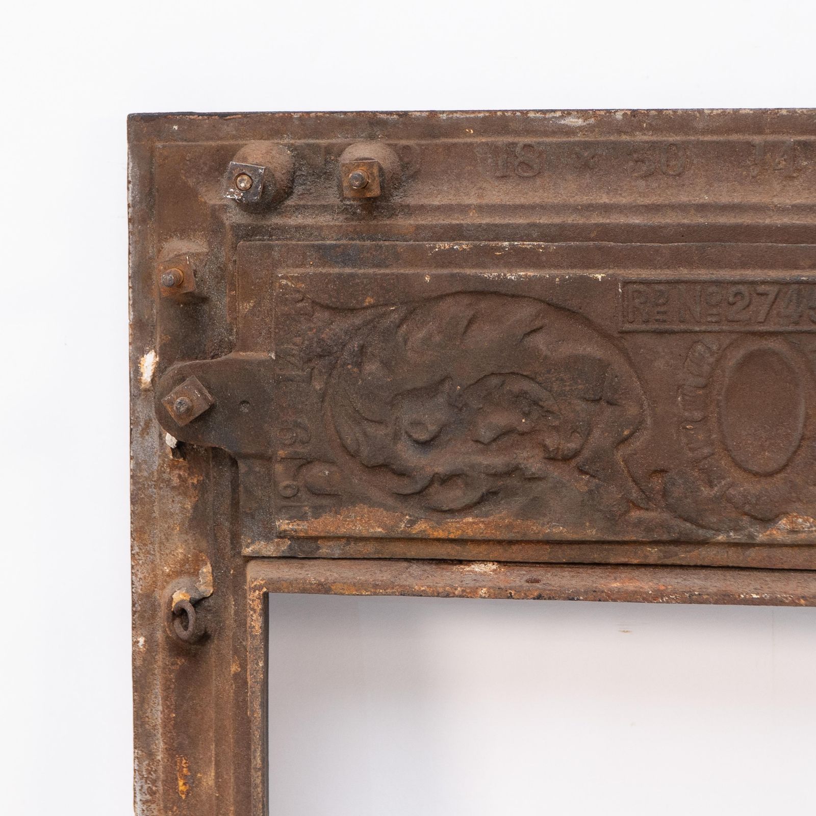 photo vinterior A Late Victorian Fireplace With Stylized Floral Details To The Top