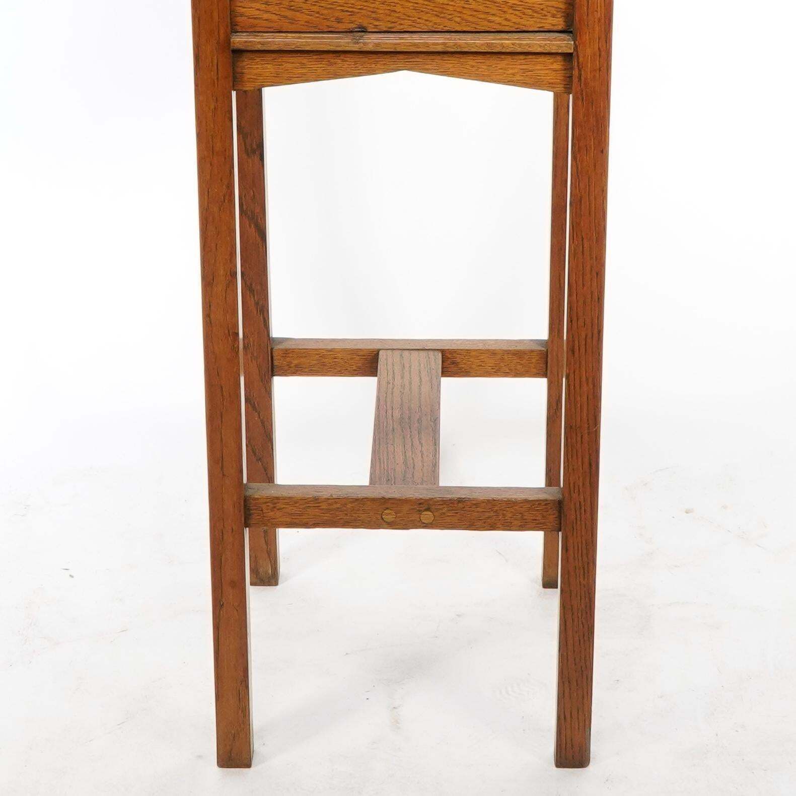 photo buy Shapland & Petter. An Arts & Crafts Oak Planter With Copper Heart Shaped Panels