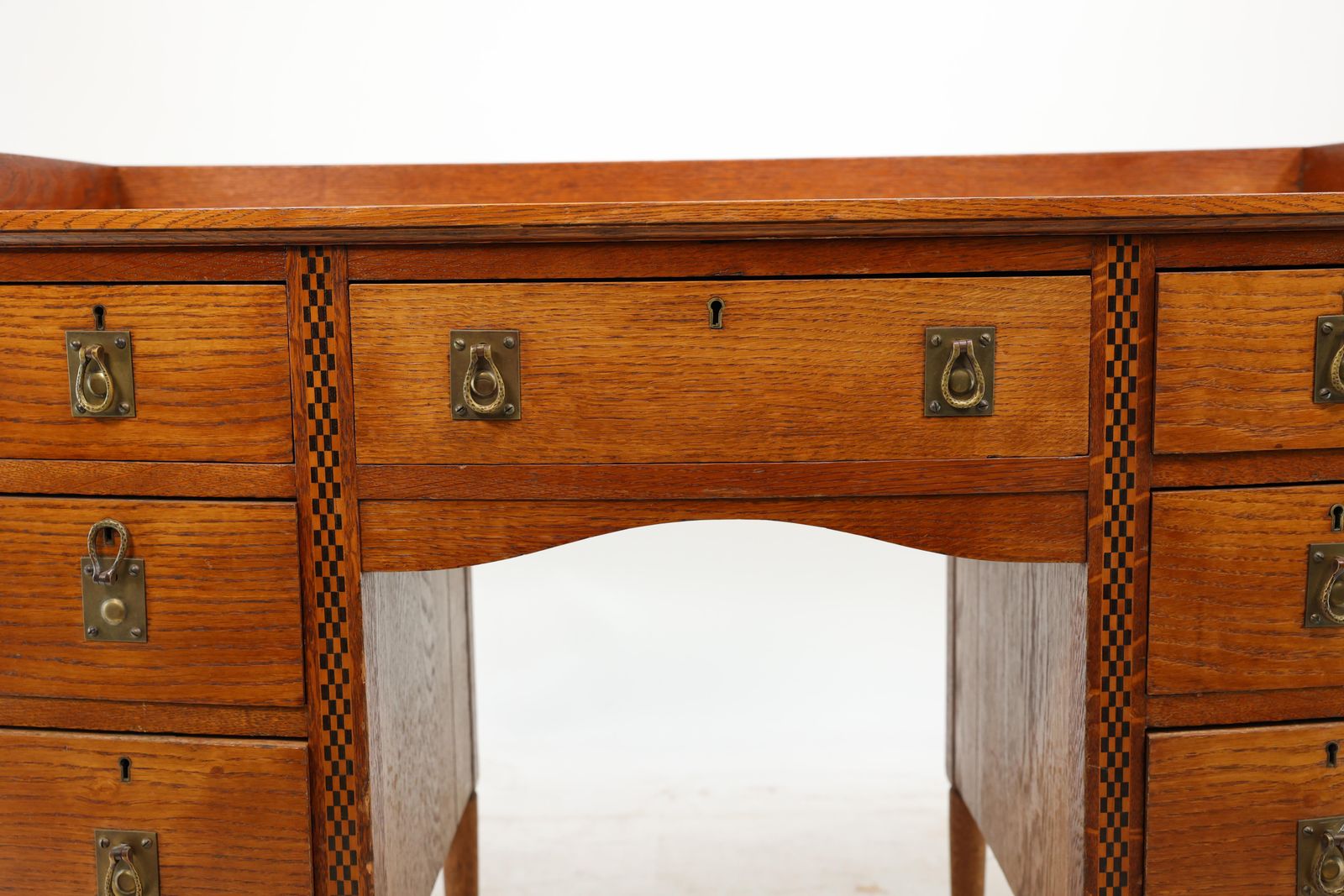 photo for sale Waring And Gillow. An Arts And Crafts Bow Fronted Kneehole Twin Pedestal Desk