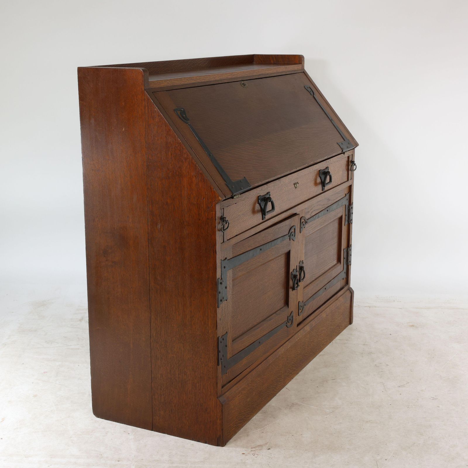 Leonard Wyburd For Liberty & Co. An Arts & Crafts Oak Bureau With Iron Hinges photo buy