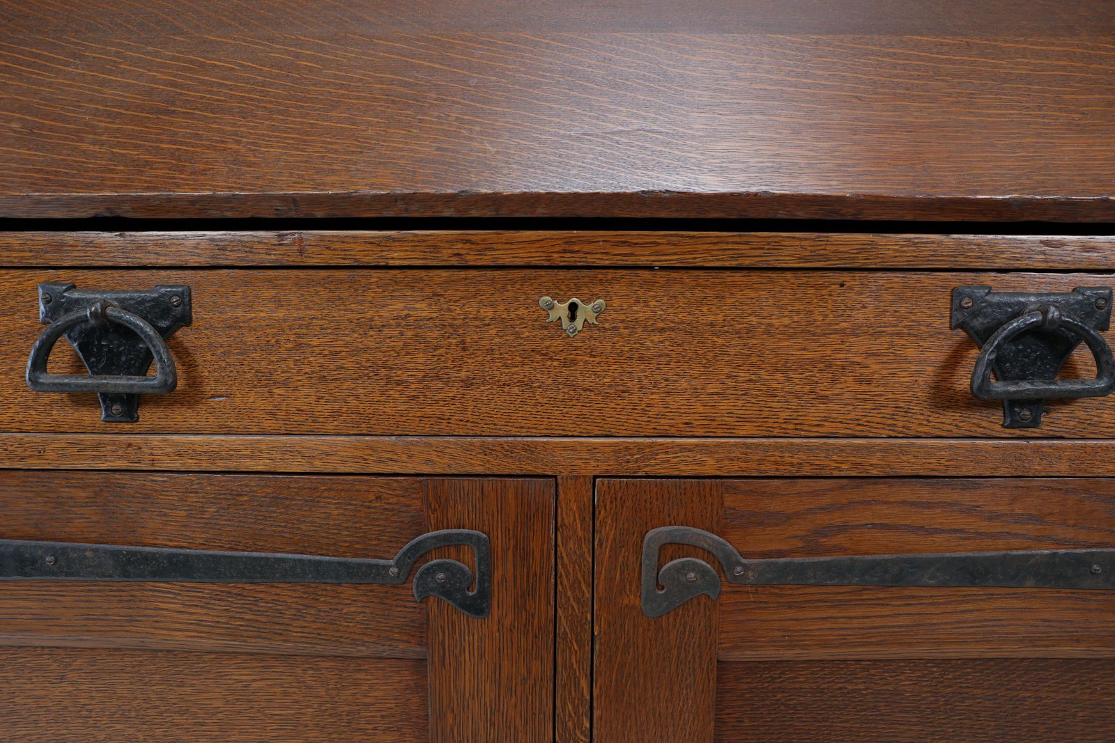 photo vintage Leonard Wyburd For Liberty & Co. An Arts & Crafts Oak Bureau With Iron Hinges
