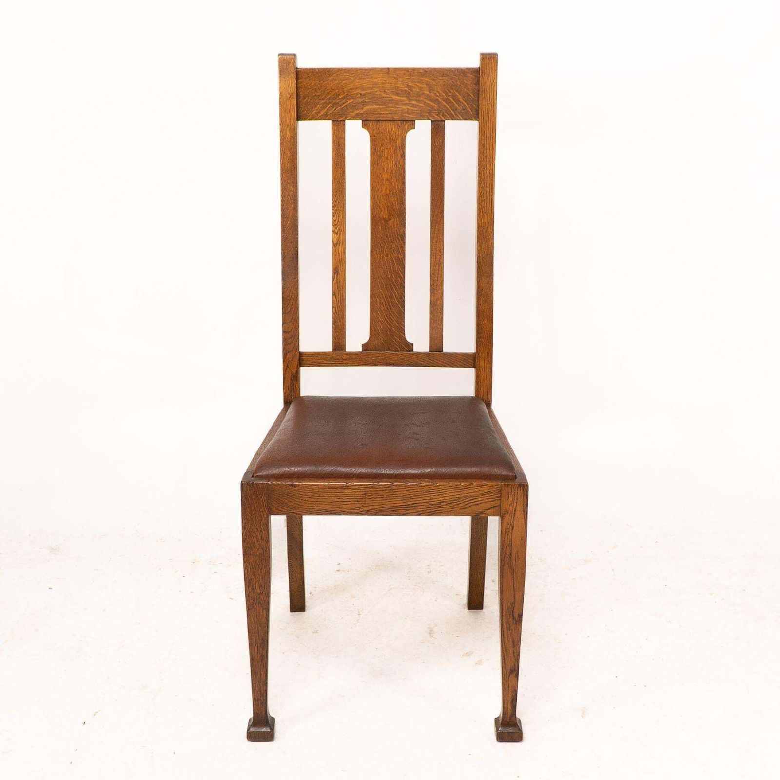 A Set Of Four Arts And Crafts Oak Dining Chairs With Comfortable Shaped Backs photo for sale