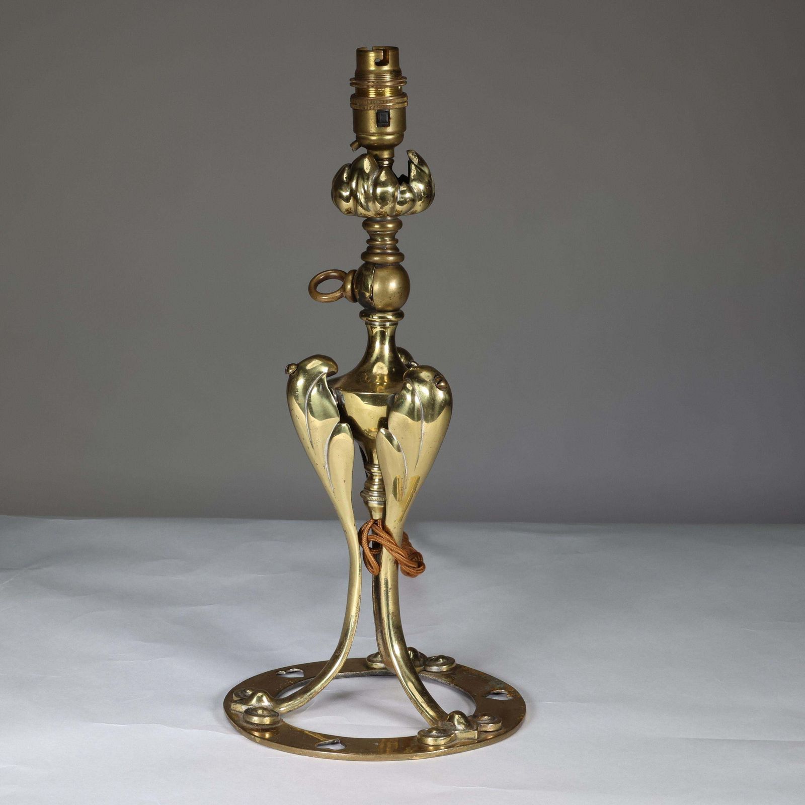 An Arts & Crafts Brass Table Lamp Tulip Shaped With Heart Cut Outs To The Base photo Lighting