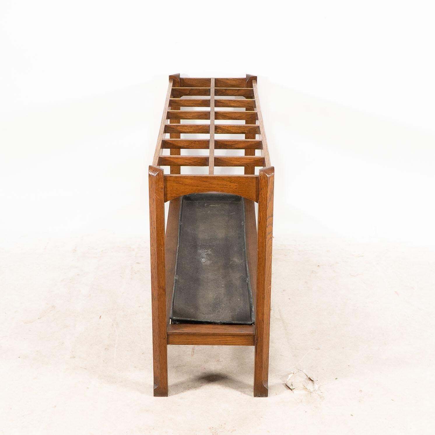 An Arts And Crafts Oak Stick And Umbrella Stand With Fourteen Sections photo buy
