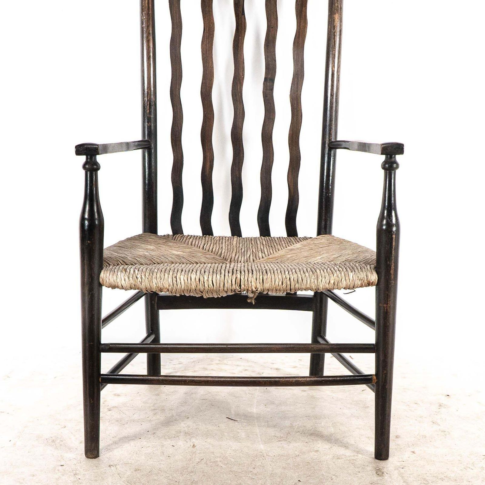 photo for sale Liberty & Co. An Arts & Crafts Rush Seat Armchair With Wavy Shaped Back Slats