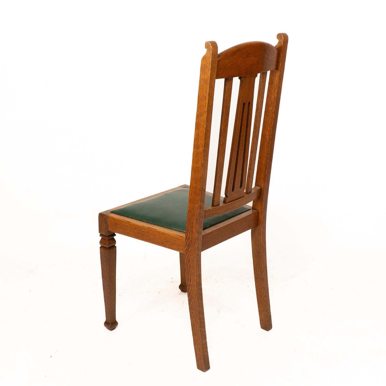 photo vintage Shapland And Petter. A Set Of Four Arts And Crafts Oak Dining Chairs