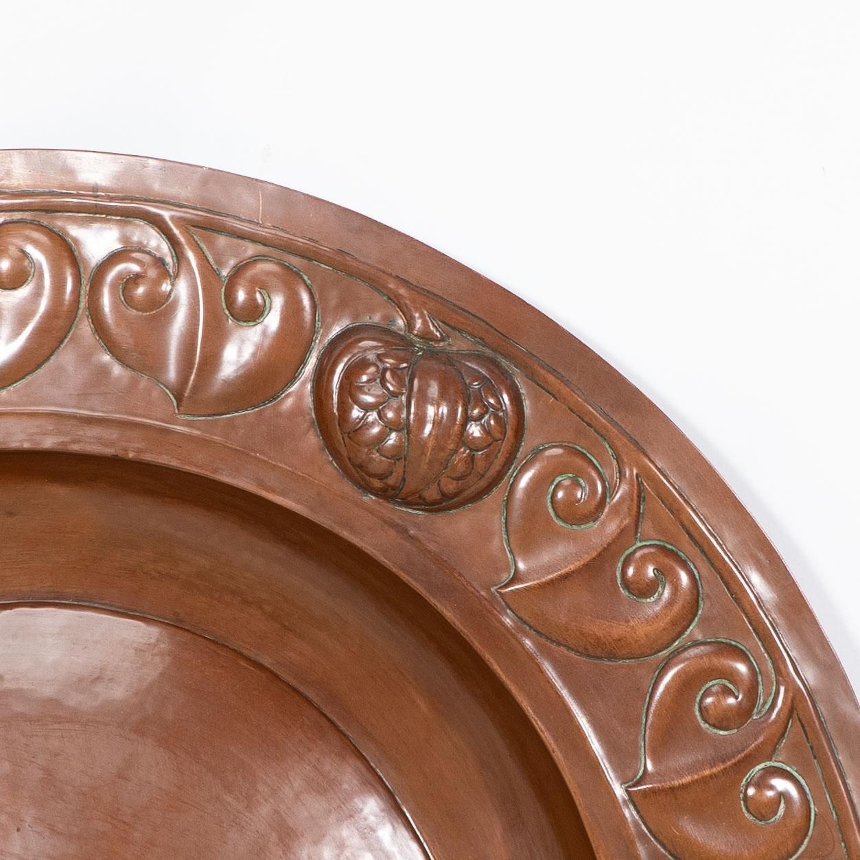 photo furniture A Large Arts And Crafts Hand Formed Copper Charger With Stylized Decoration