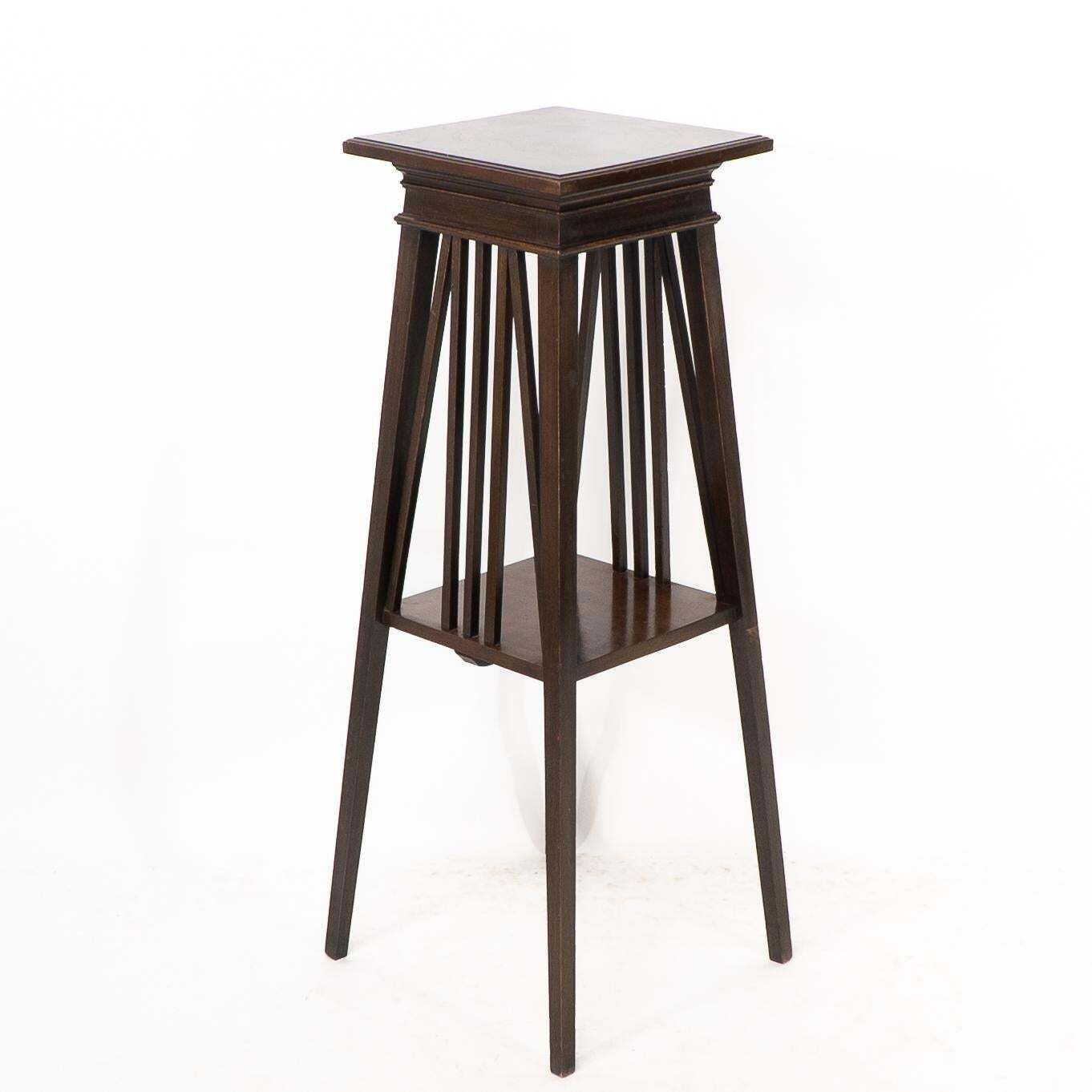 Liberty & Co In The Style Of E W Godwin. An Anglo Japanese Two Tier Plant Stand photo vinterior