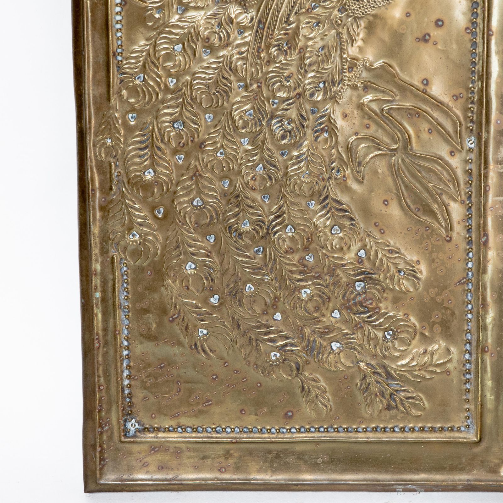 An Aesthetic Movement Brass Mirror With Stylized Peacocks Perched On A Branch photo vinterior