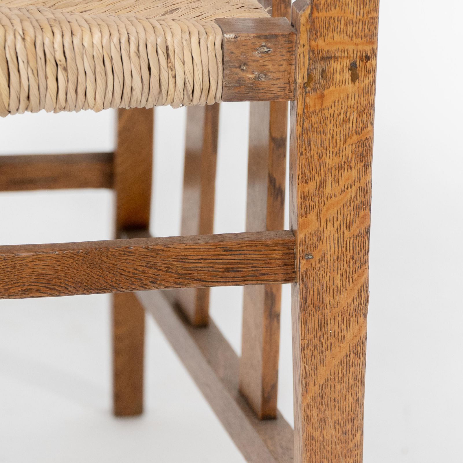 photo buy Liberty & Co. An Arts & Crafts Rush Seat Armchair With A Shaped Back