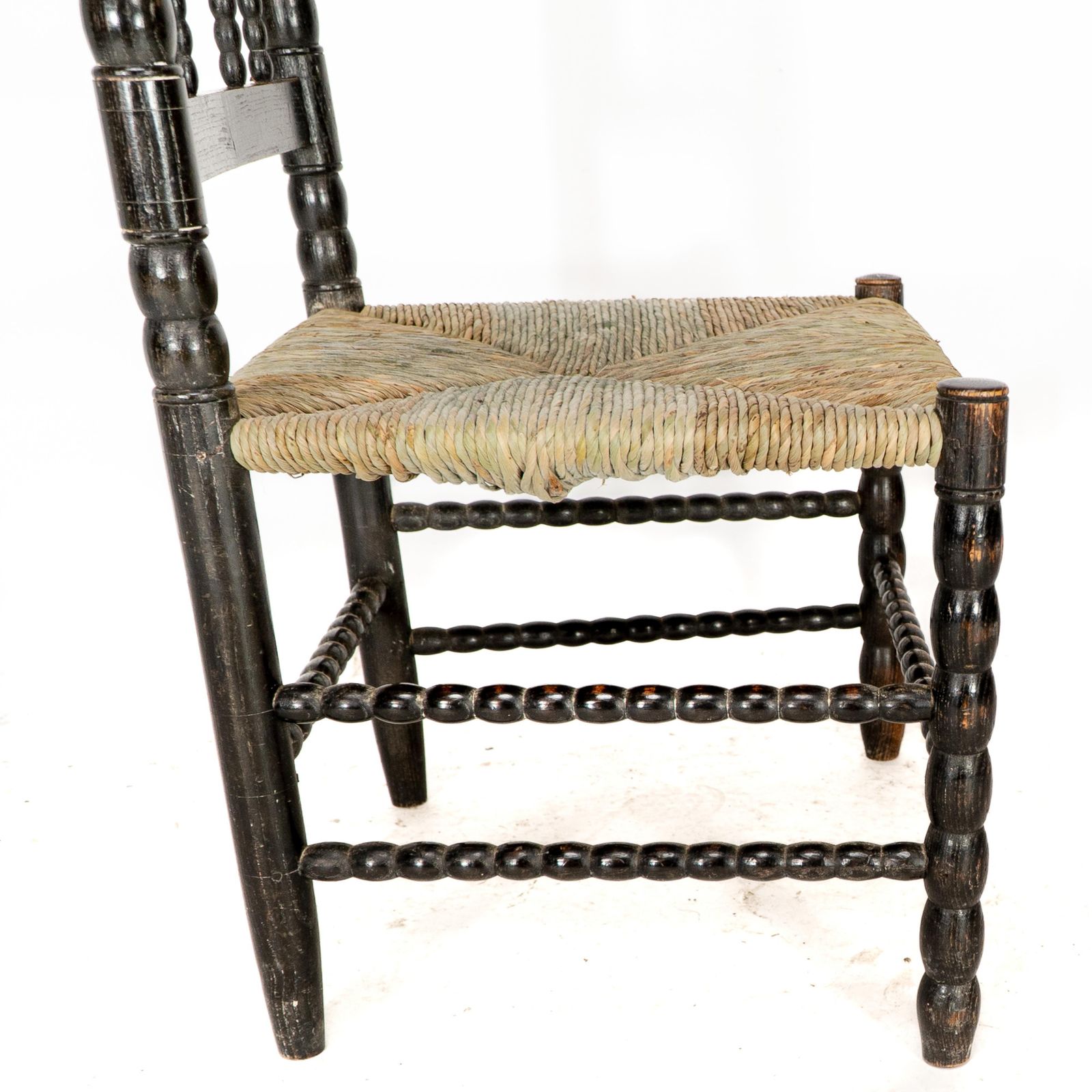 photo vinterior Ernest Gimson. A Rare Cotswold School Ebonised Bobbin Turned Rush Seat Low Chair