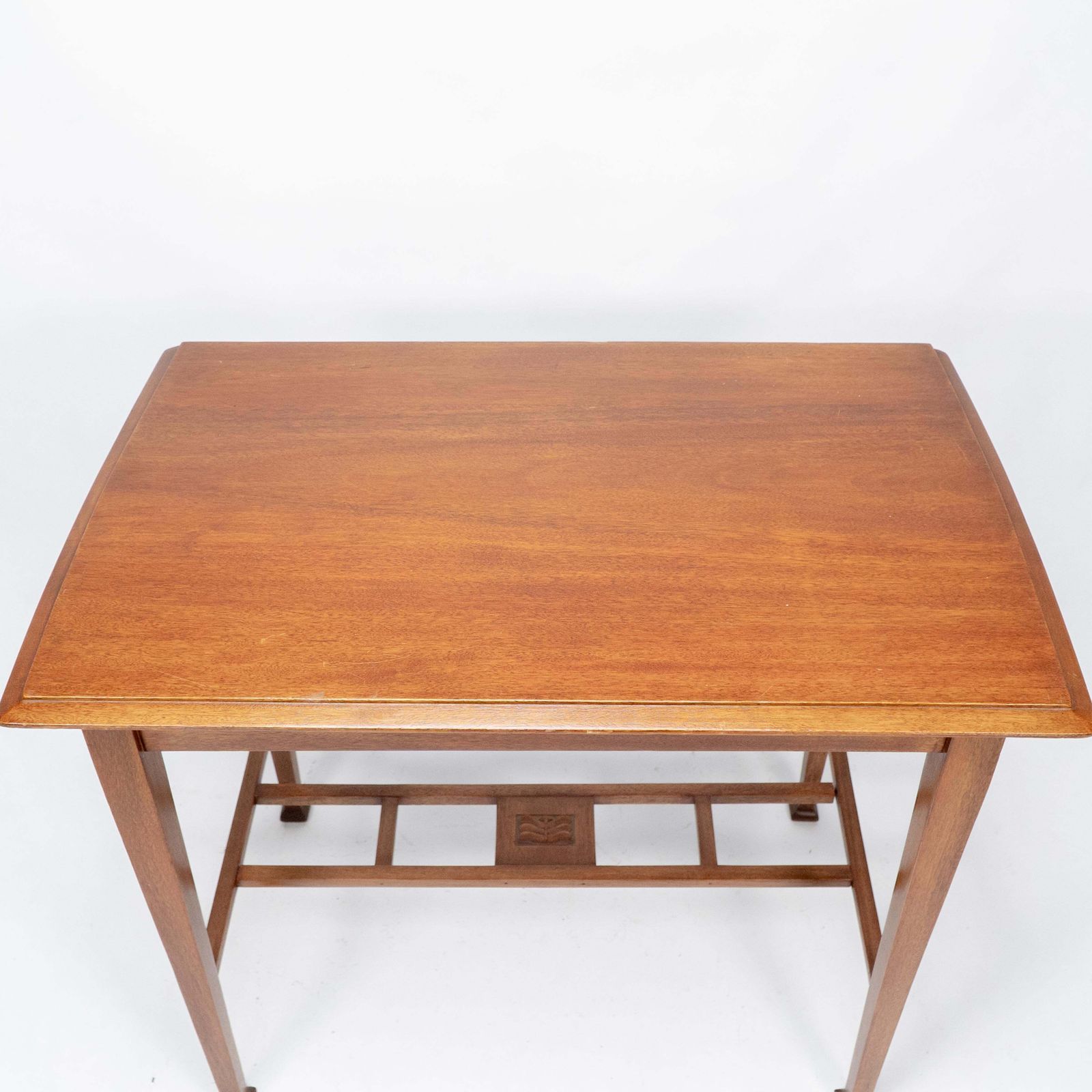 photo furniture An Arts & Crafts Glasgow School Walnut Side Table W. Moulded Subtly Curving Edge