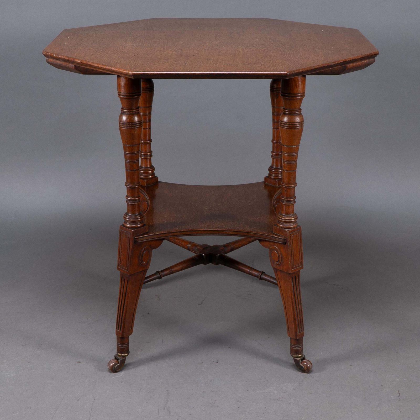 Jas Shoolbred. An Aesthetic Movement Walnut Octagonal Center Table photo Furniture