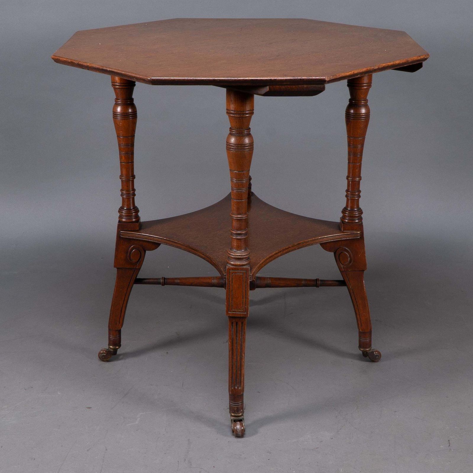 Jas Shoolbred. An Aesthetic Movement Walnut Octagonal Center Table photo 2550.0