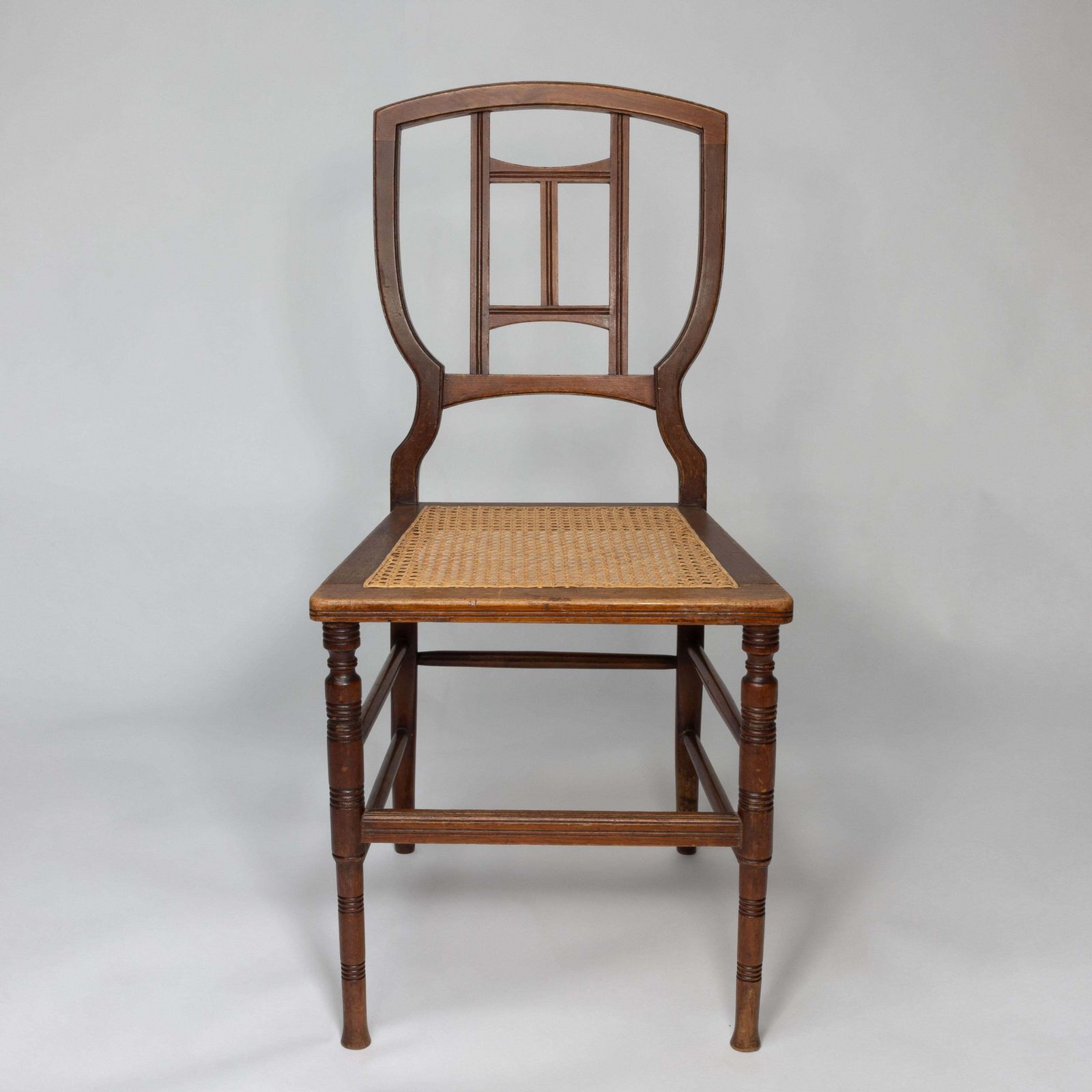 H W Batley Attr. Jas Shoolbred Pair Of Aesthetic Movement Cane Seat Beech Chairs photo 3000.0