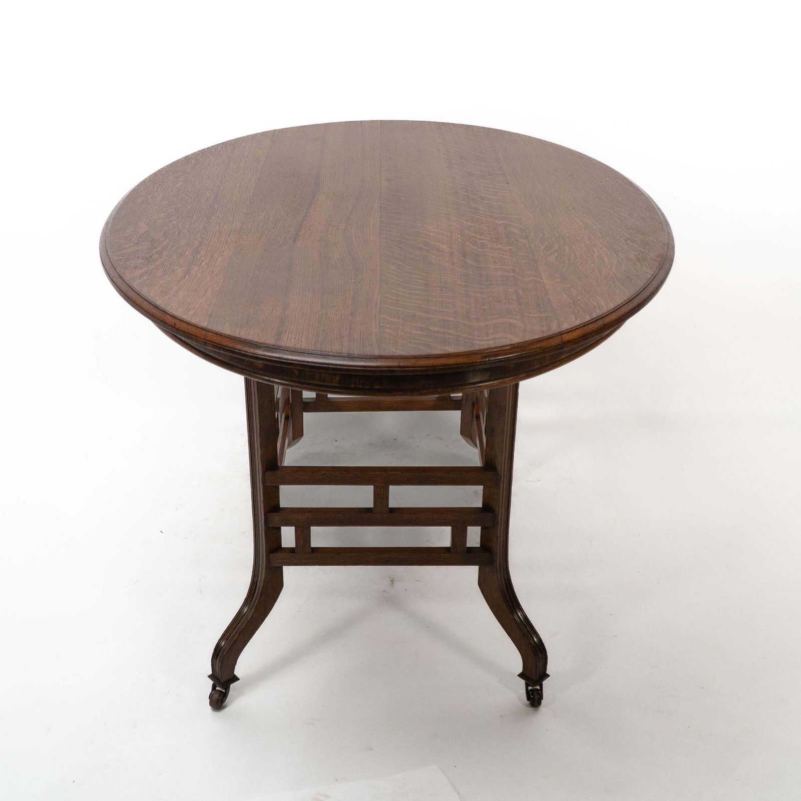 Lambs Of Manchester, Stamped Lambs. A Rare Anglo Japanese Oak Oval Centre Table photo for sale
