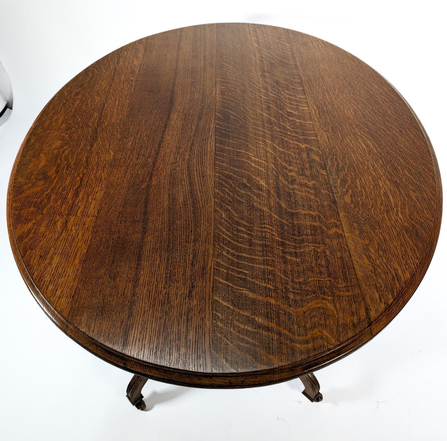 photo furniture Lambs Of Manchester, Stamped Lambs. A Rare Anglo Japanese Oak Oval Centre Table