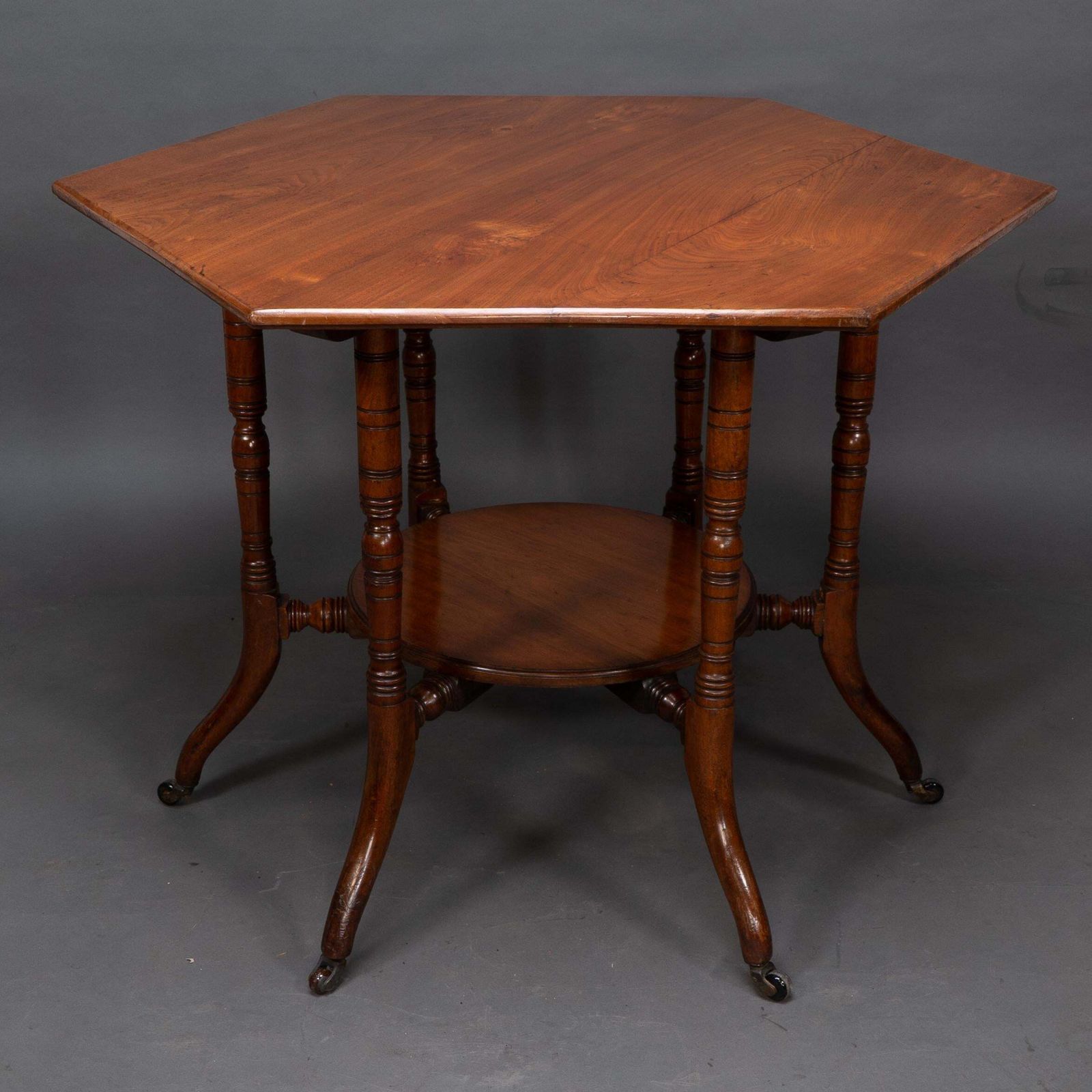 Collinson & Lock Attributed. An Aesthetic Movement Walnut Octagonal Center Table photo for sale