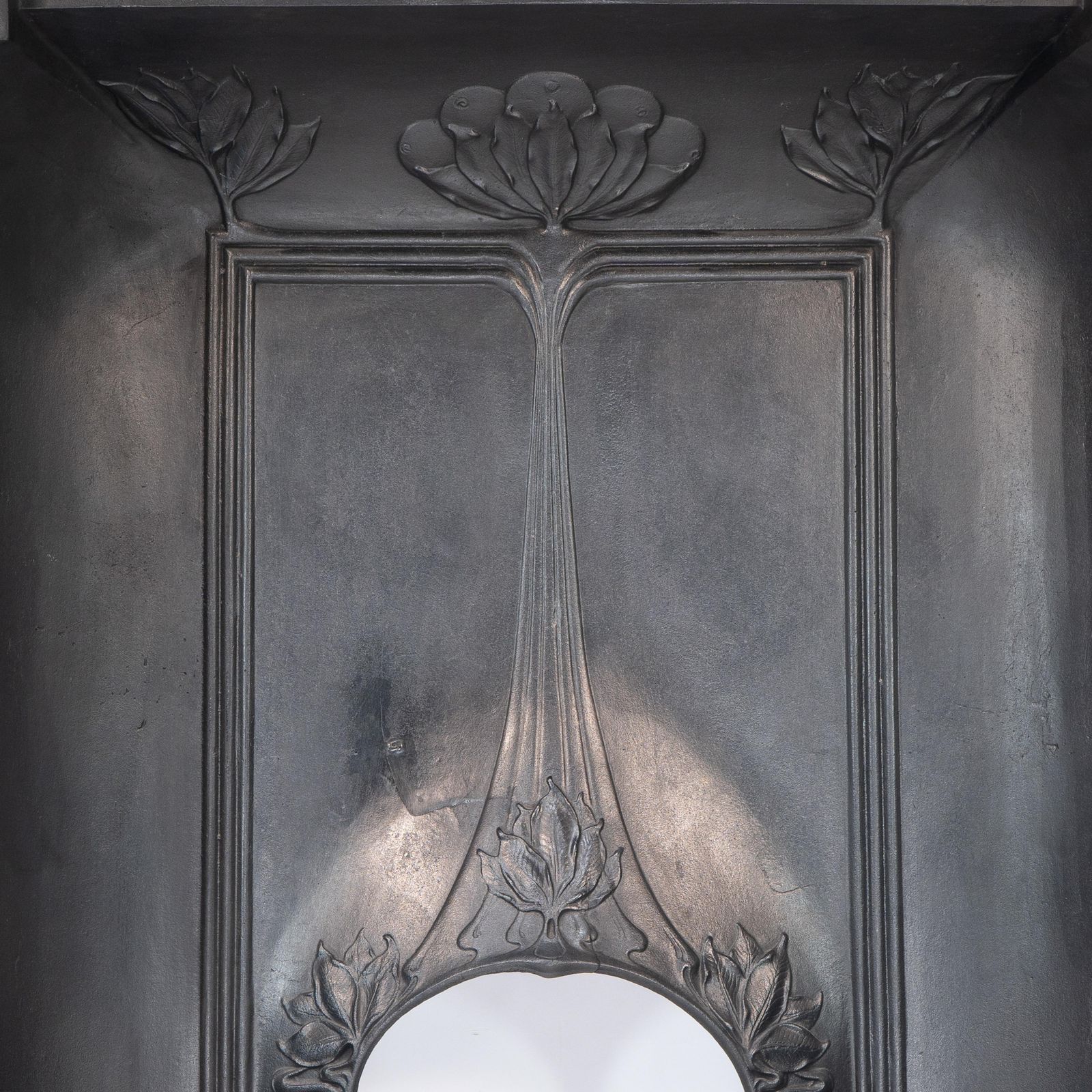 Arts & Crafts Cast Iron Fireplace With Curved Sides & Stylized Floral Decoration photo vintage