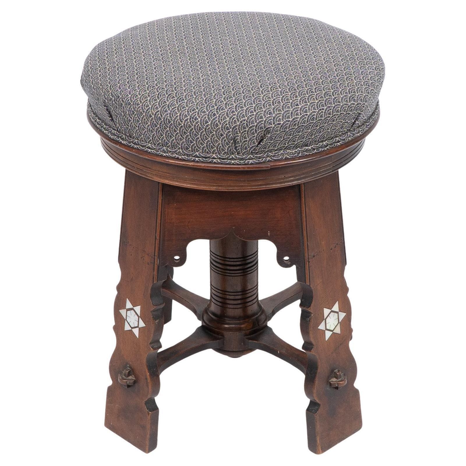Liberty And Co Attri. A Rare Moorish Walnut Revolving Stool With Moorish Arches