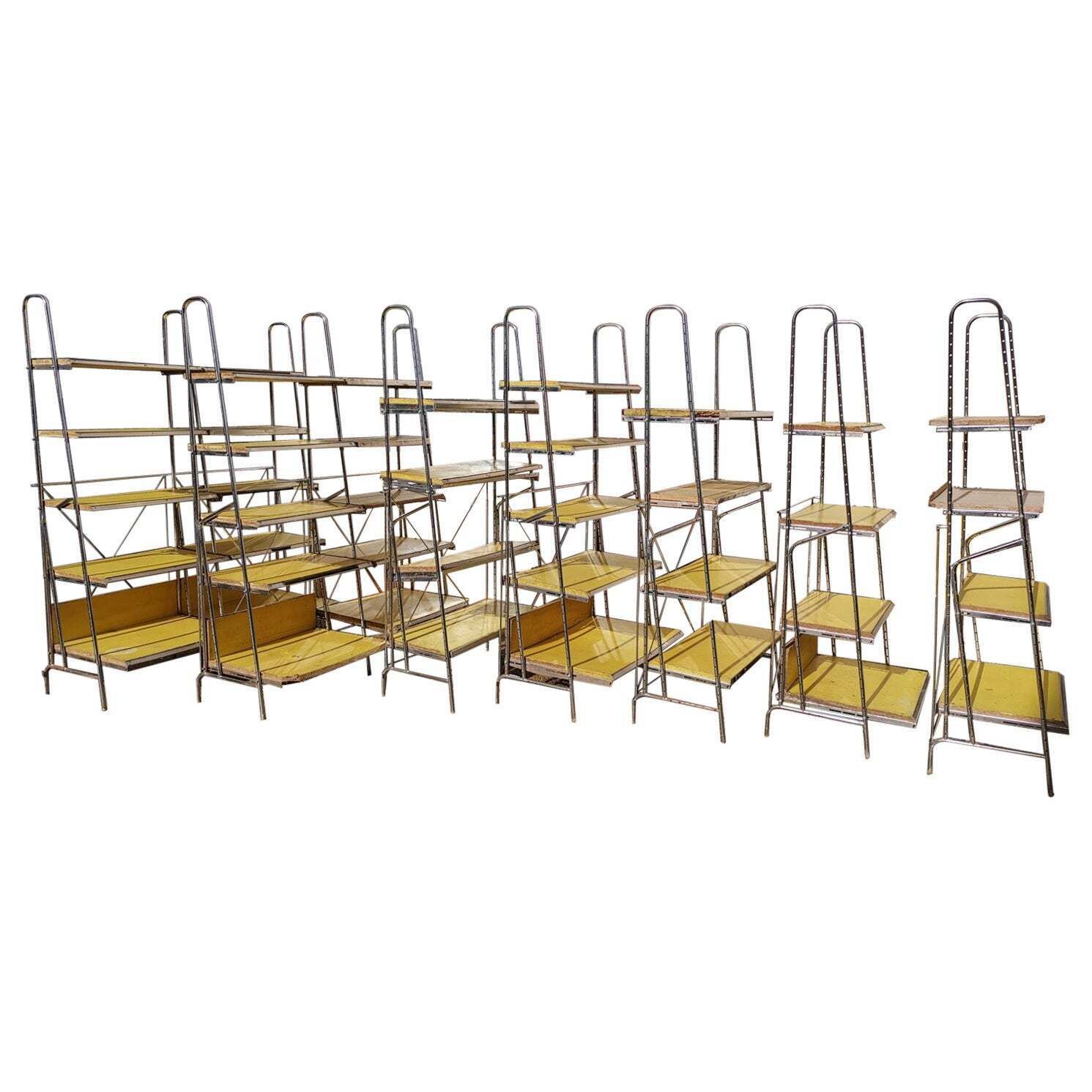 Stylish Midcentury Chrome On Steel Shop Shelving With Braced Back Supports