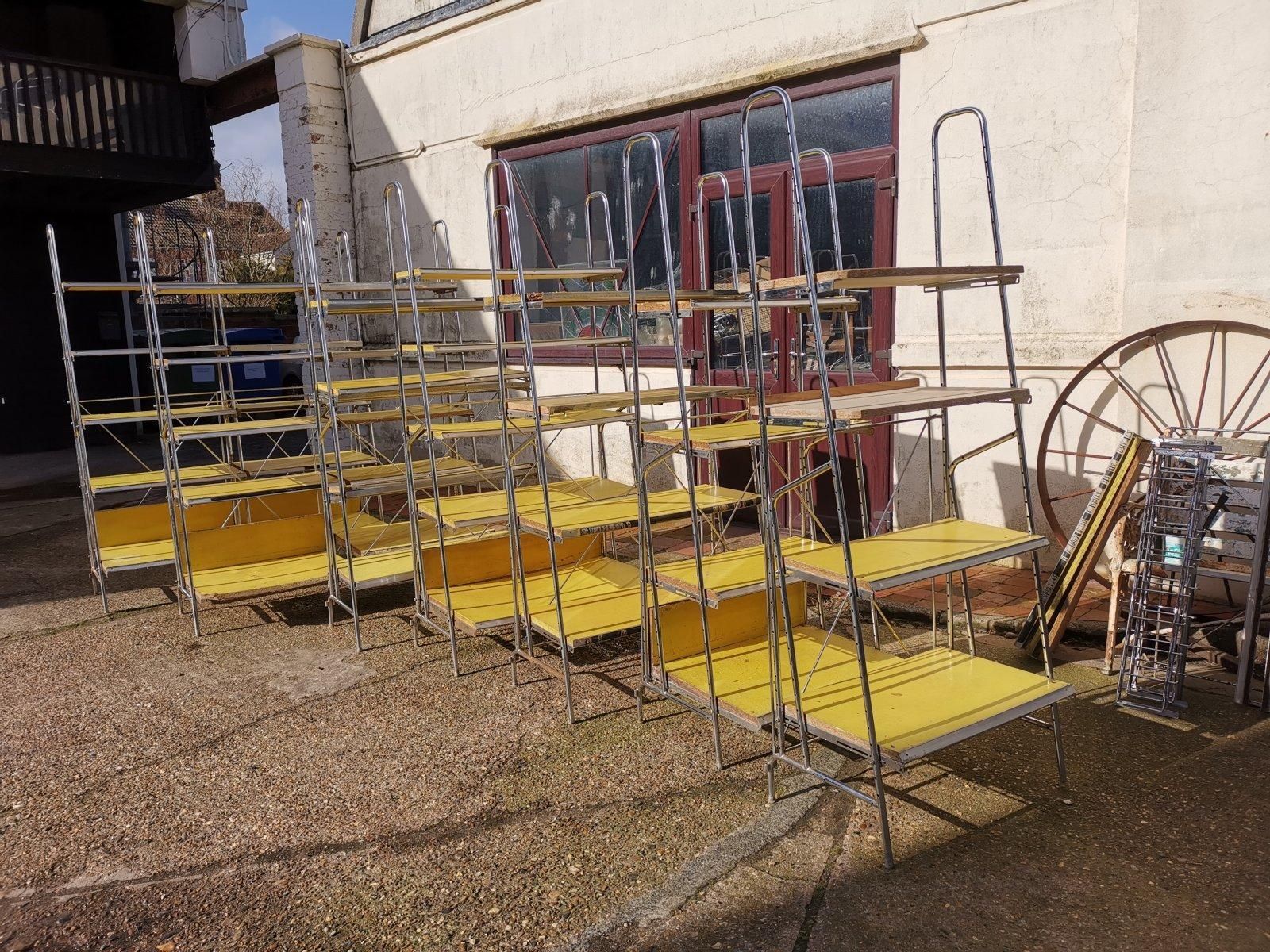Stylish Midcentury Chrome On Steel Shop Shelving With Braced Back Supports photo furniture