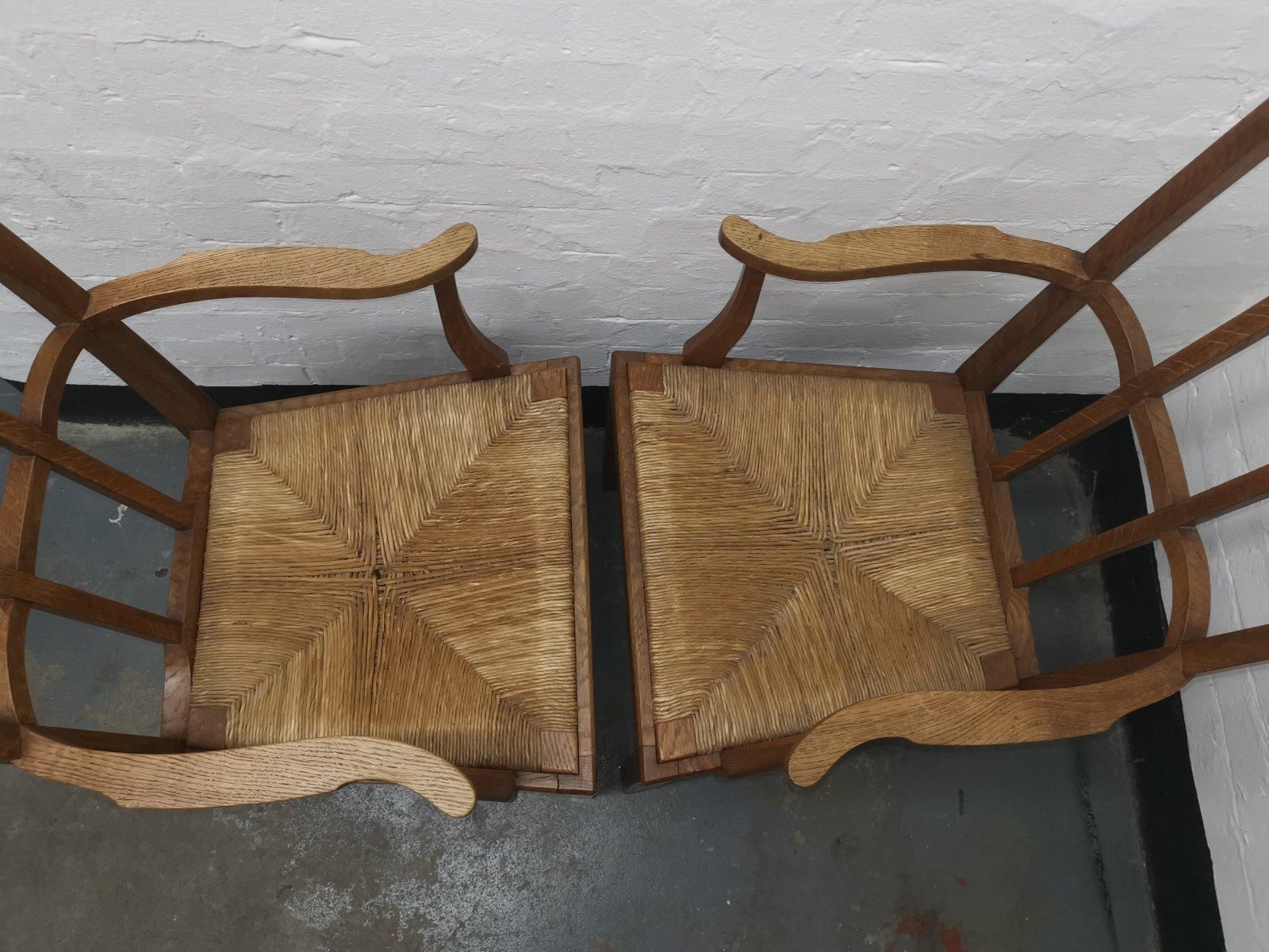 photo furniture Pair Of Cotswold School Arts & Crafts Oak Lattice Back Armchairs With Rush Seats