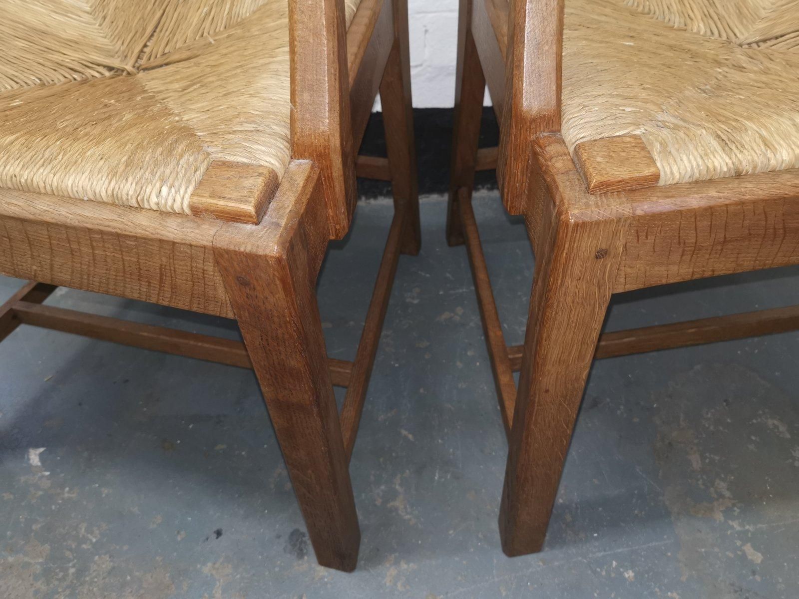 photo vinterior Pair Of Cotswold School Arts & Crafts Oak Lattice Back Armchairs With Rush Seats