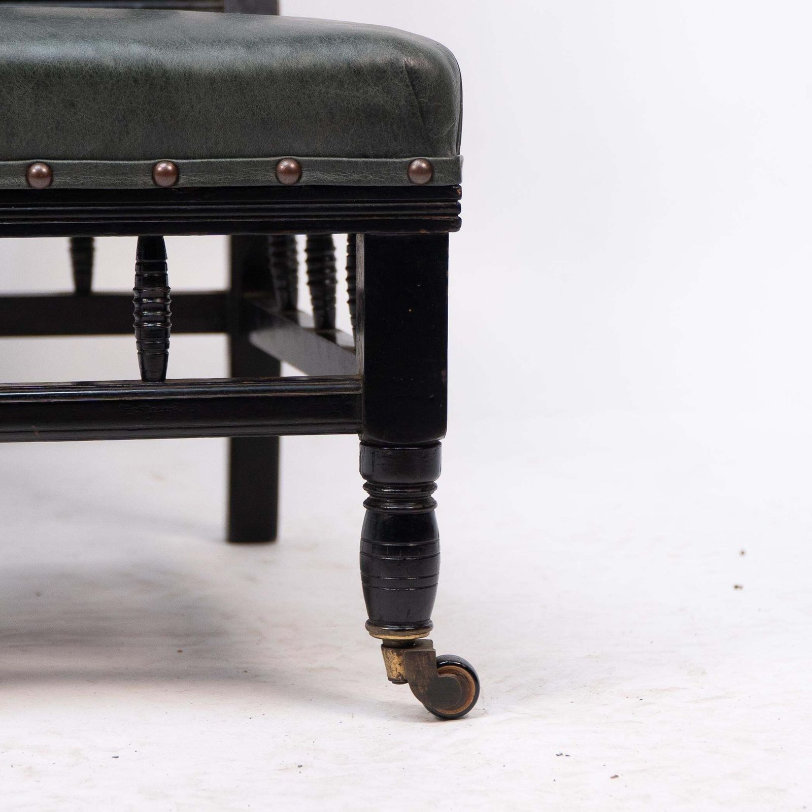 1836.0 Gregory & Co. An Aesthetic Movement Nursing Chair With Stylized Carved Sunflower photo