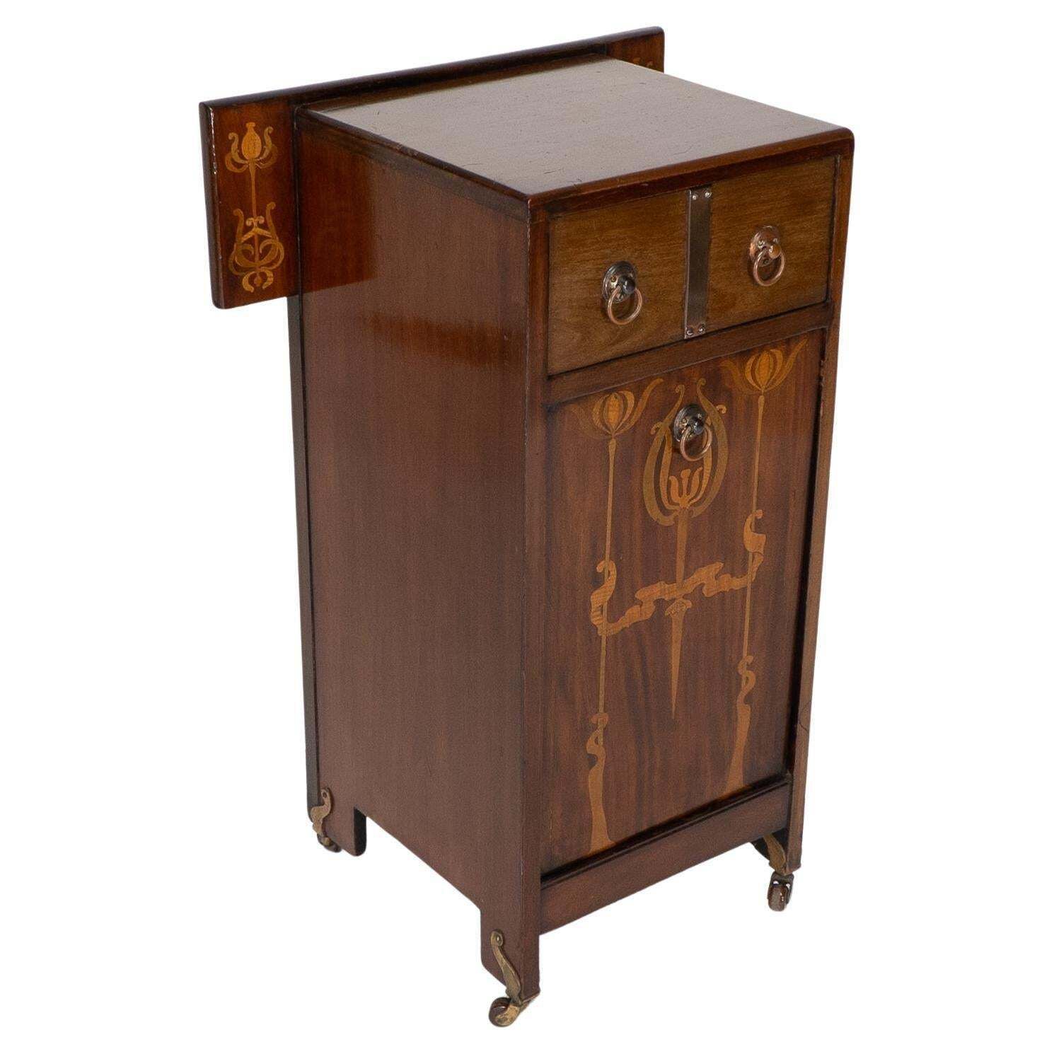 Liberty & Co Attributed. Arts & Crafts Coal Purdonium With Inlaid Floral Details