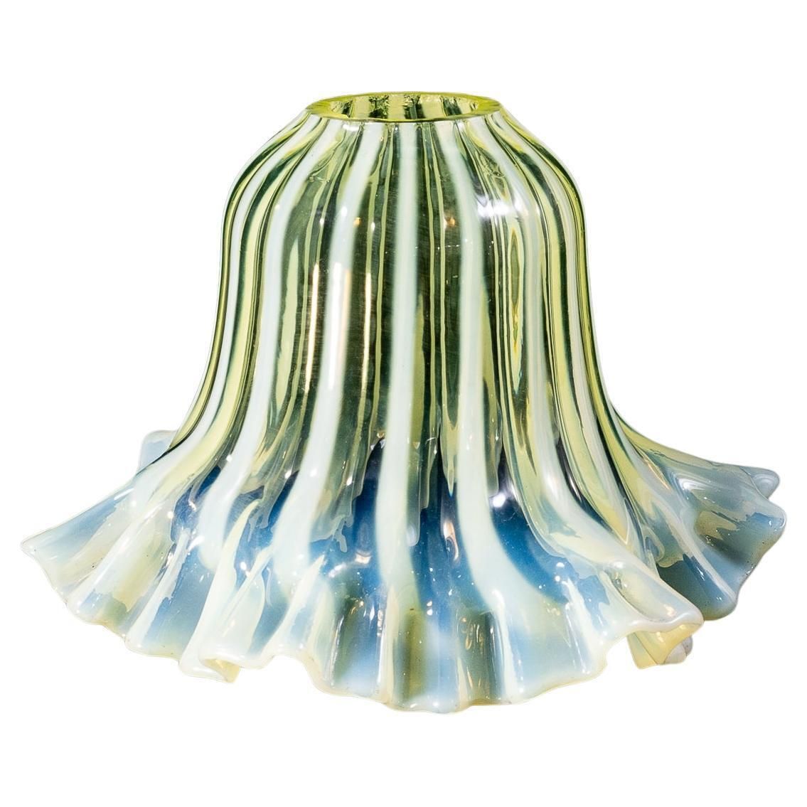 A Pleated Vaseline Shade, Consisting Of Alternating Stripes And A Ruffled Rim.