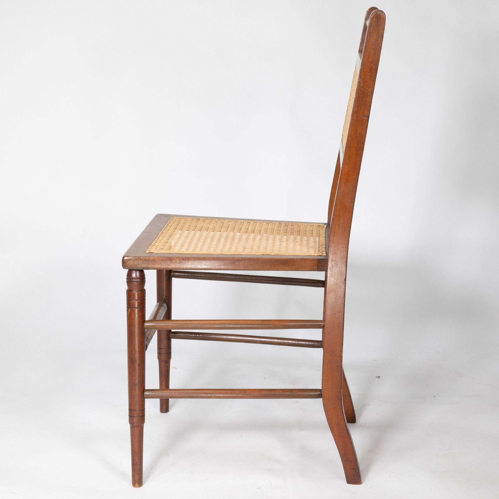 3264.0 E W Godwin (Attributed). A Set Of Four Anglo Japanese Cane Seat Chairs photo