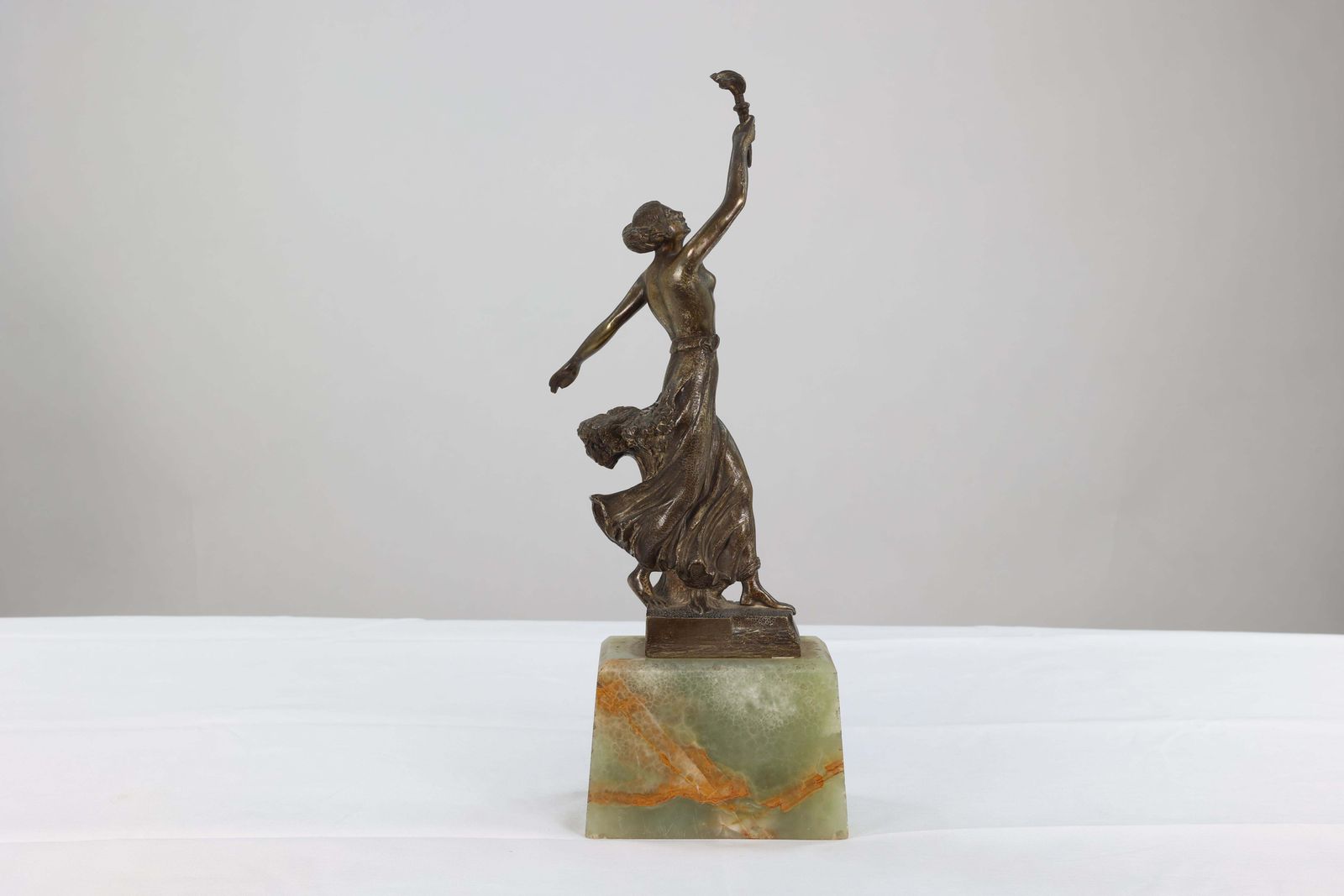 B V Fernandez. An Art Deco Bronze Figure On An Onyx Base photo furniture
