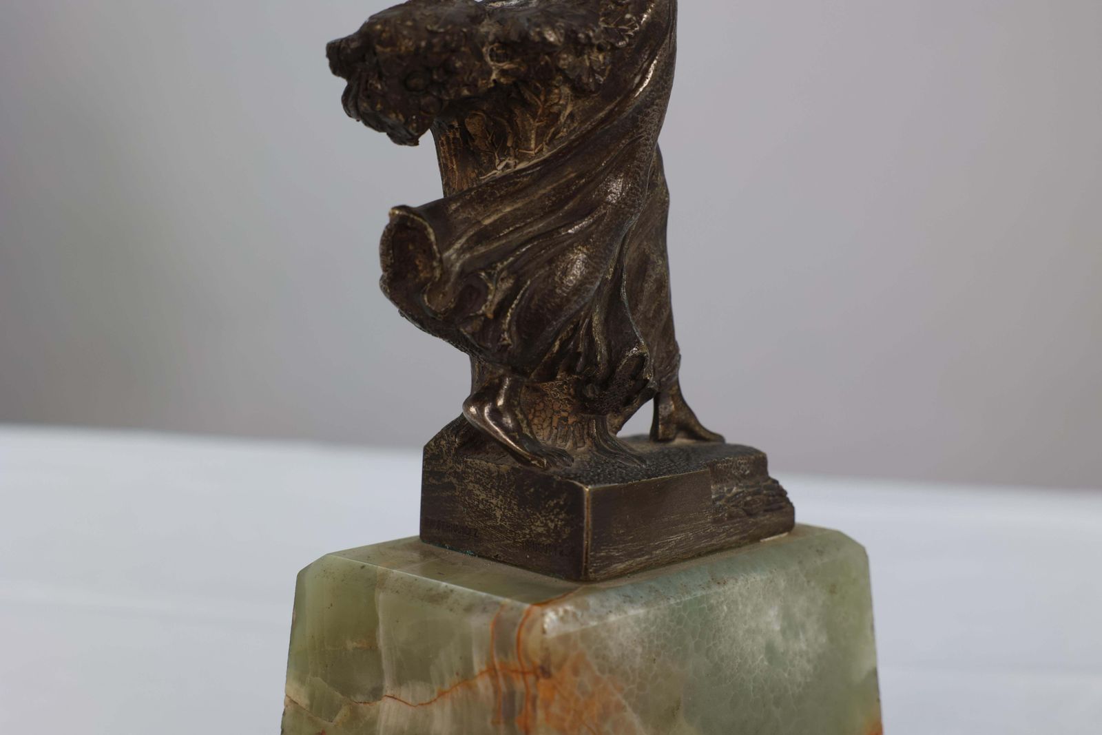 photo furniture B V Fernandez. An Art Deco Bronze Figure On An Onyx Base