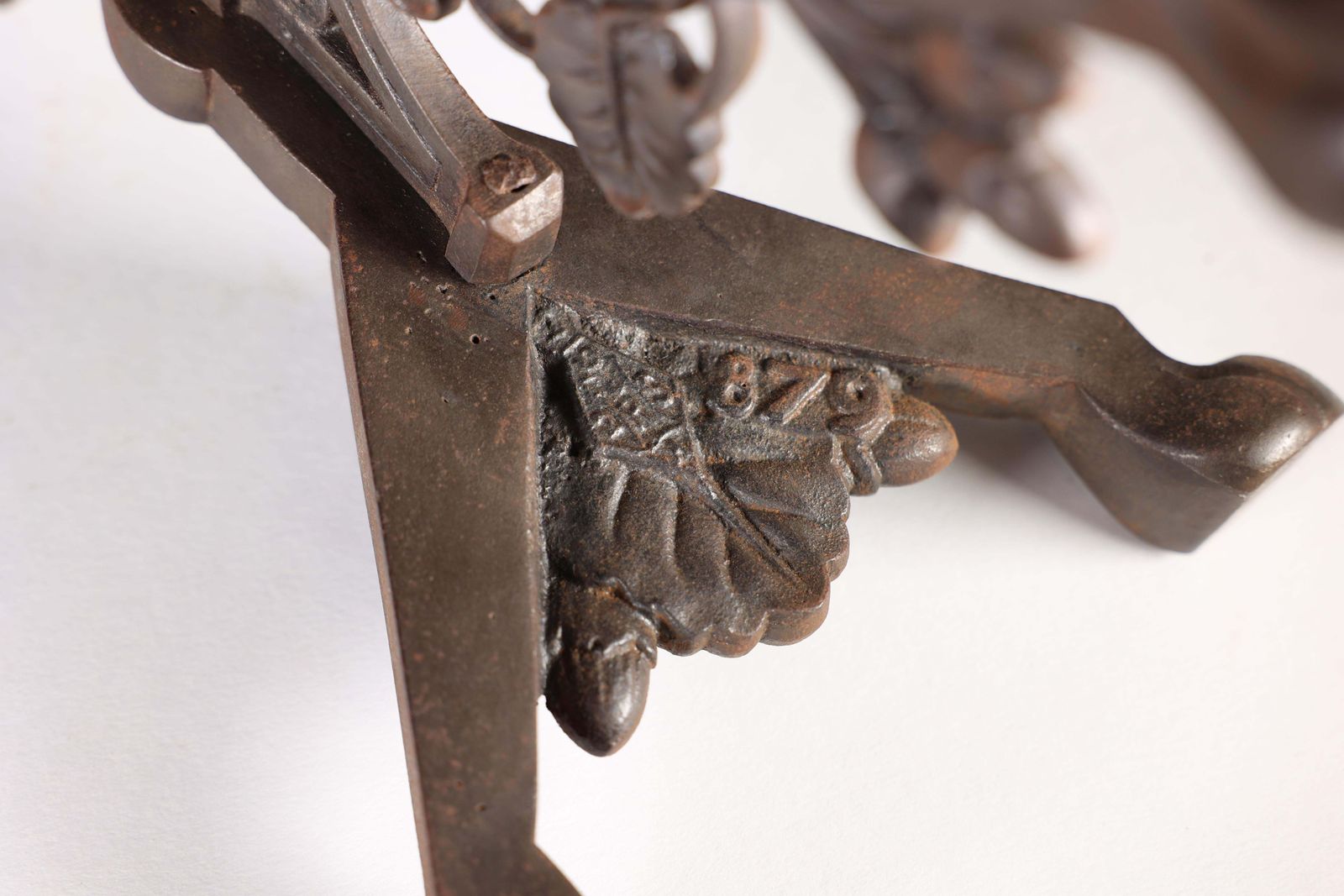 653.0 DR C Dresser (Style Of). A Pair Of Arts And Crafts Cast Iron Fire Dogs photo