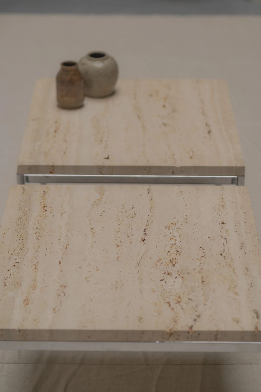 photo for sale Set Of Two Modernist Side Tables In Travertine And Chrome   1970s