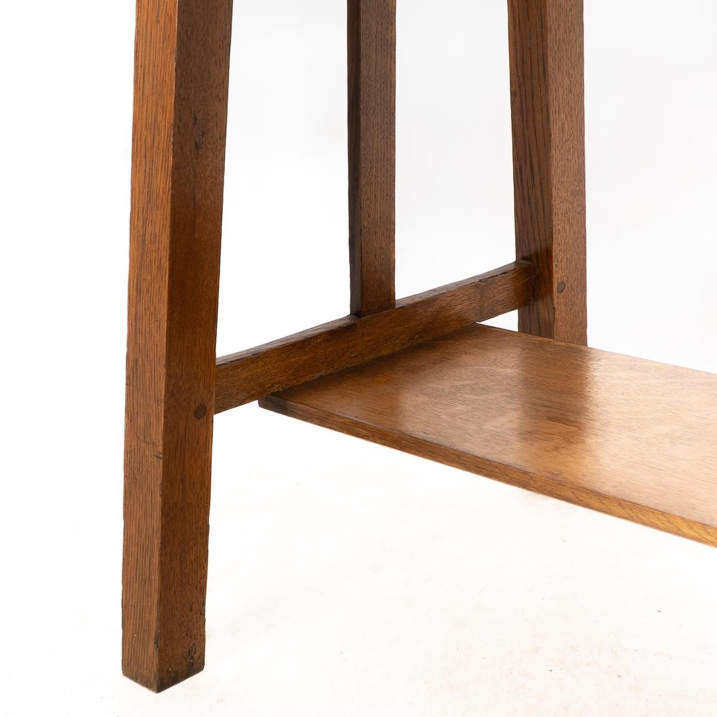 photo buy Liberty And Co. A Robust Arts And Crafts Oblong Oak Sidetable
