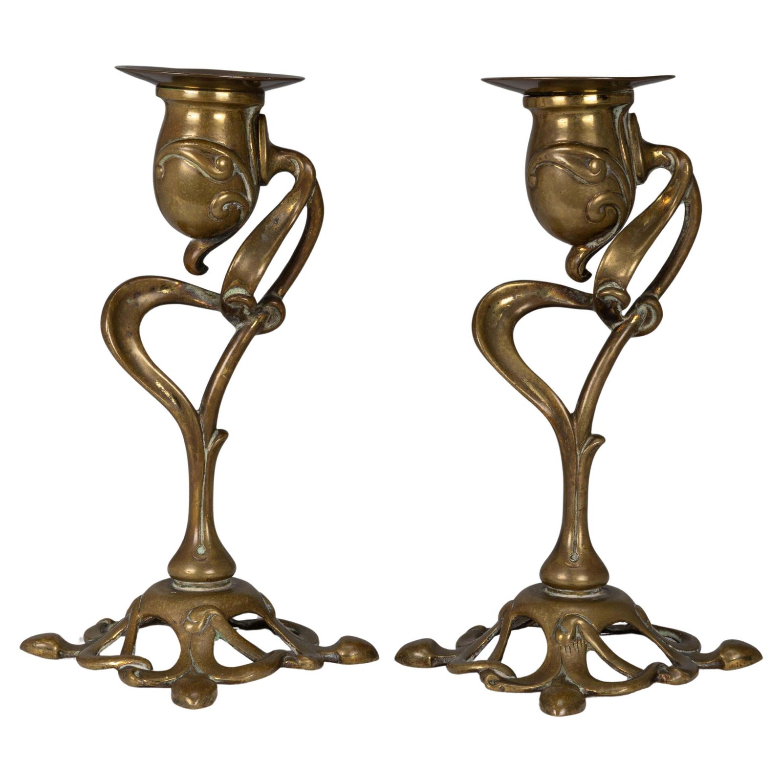 A Pair Of English Art Nouveau Candlesticks With Flowing Organic Decor