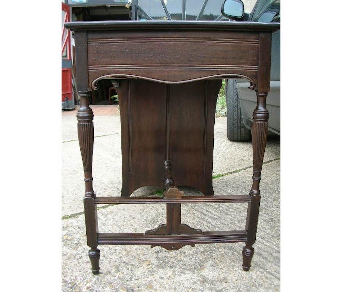 Lamb Of Manchester, An Aesthetic Movement Walnut Writing Desk. photo for sale