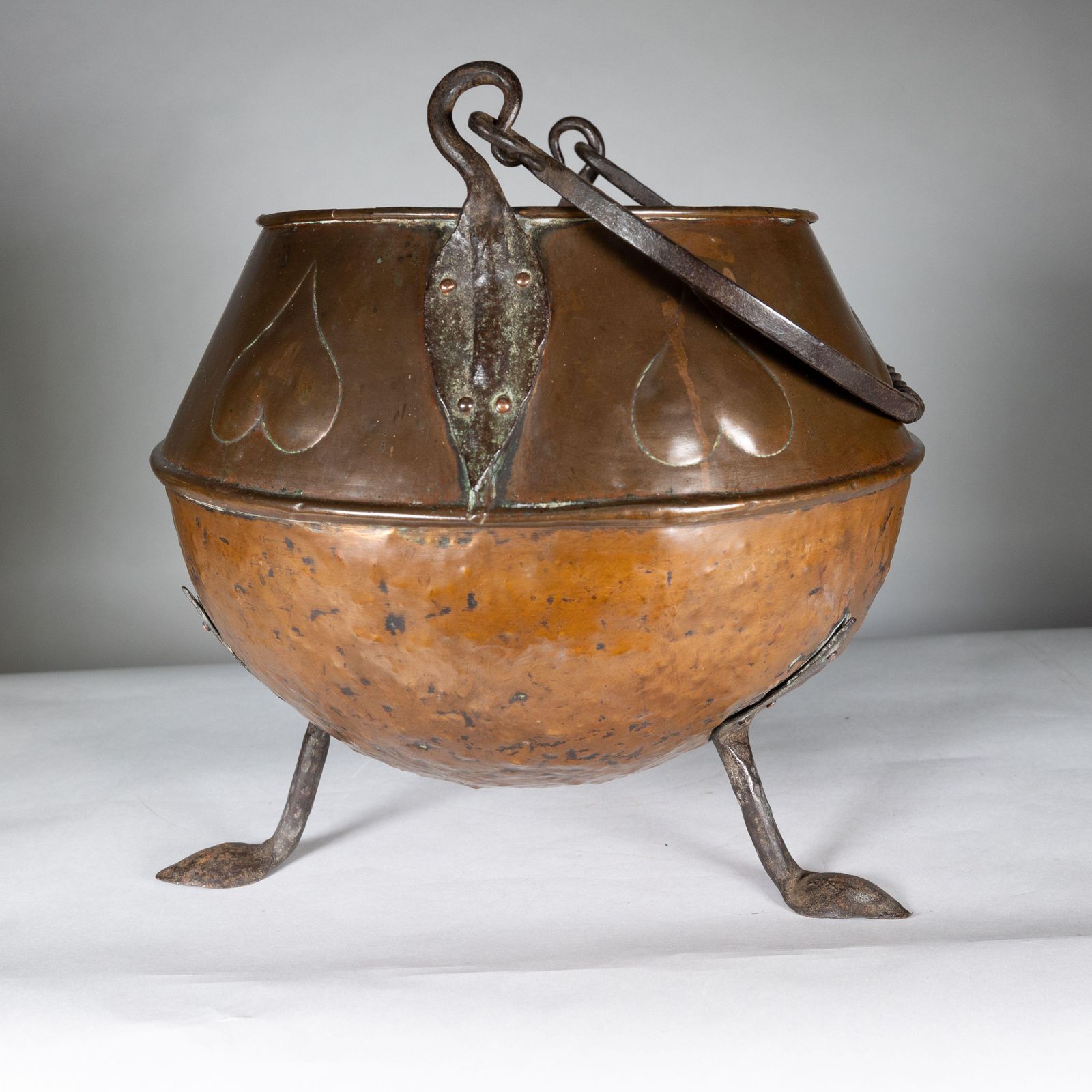 An Arts And Crafts Copper Coal Bucket With Stylized Heart Decoration photo vintage