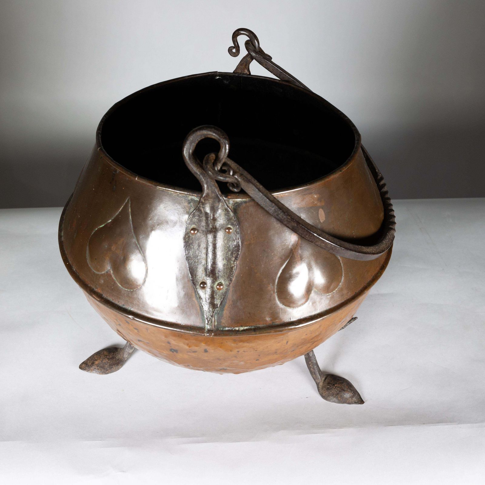 photo for sale An Arts And Crafts Copper Coal Bucket With Stylized Heart Decoration