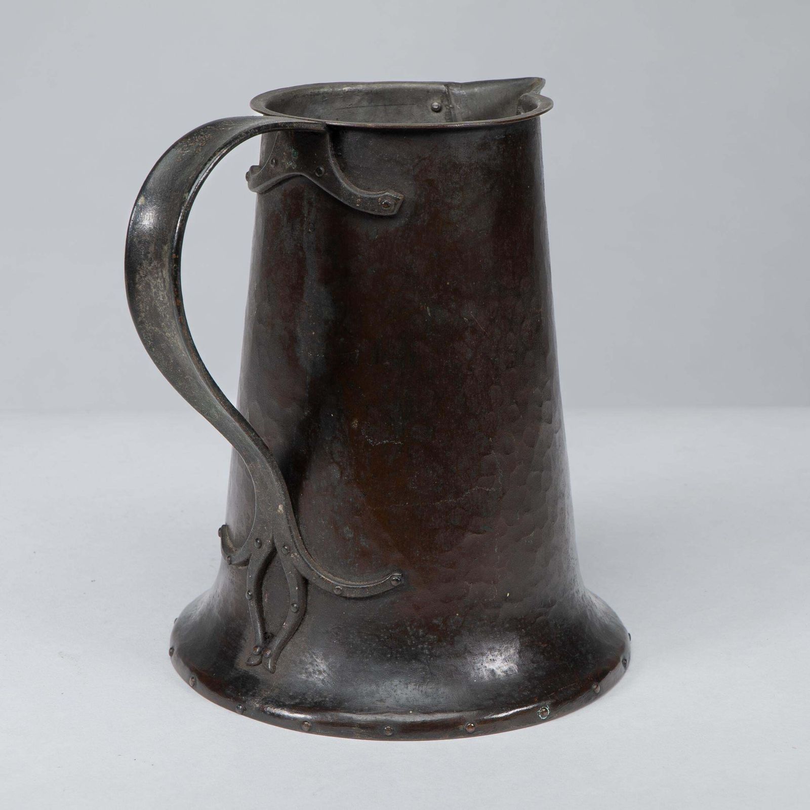 Arthur Dixon For The Bgh. An Arts & Crafts Hand Hammered Copper Jug photo vinterior
