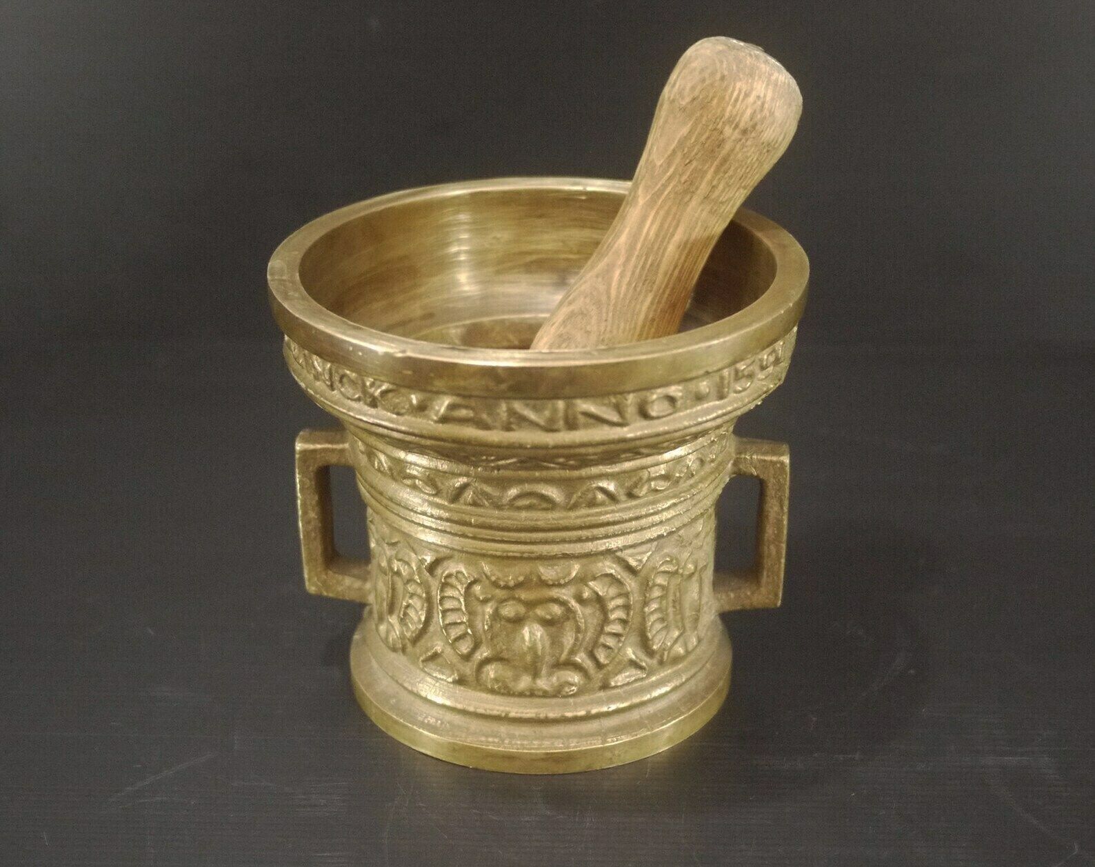 Antique Bronze Mortar And Wood Pestle "Verwint Linck Anno 1590" photo furniture