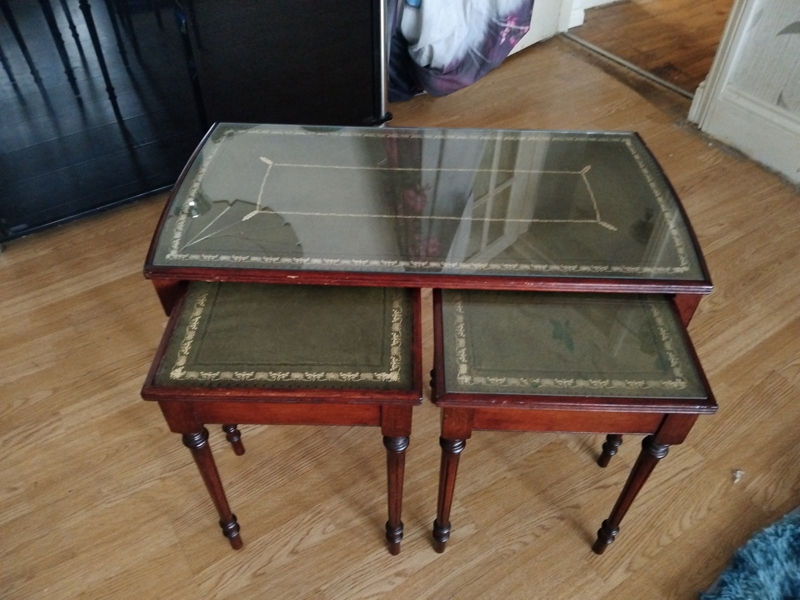 3 Piece Early 1900s Walnut Tables With Green Leather And Gold Inlay With Glass Tops photo for sale