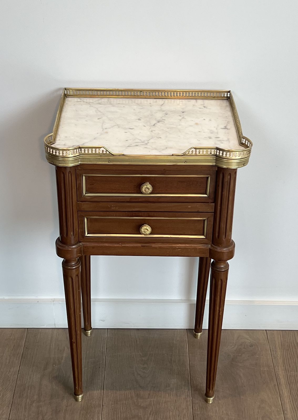 Pair Of Mahogany And Brass End Tables Or Bedside Tables With Carrara Marble Tops In The Style Of Maison Jansen. Circa 1940 photo vinterior