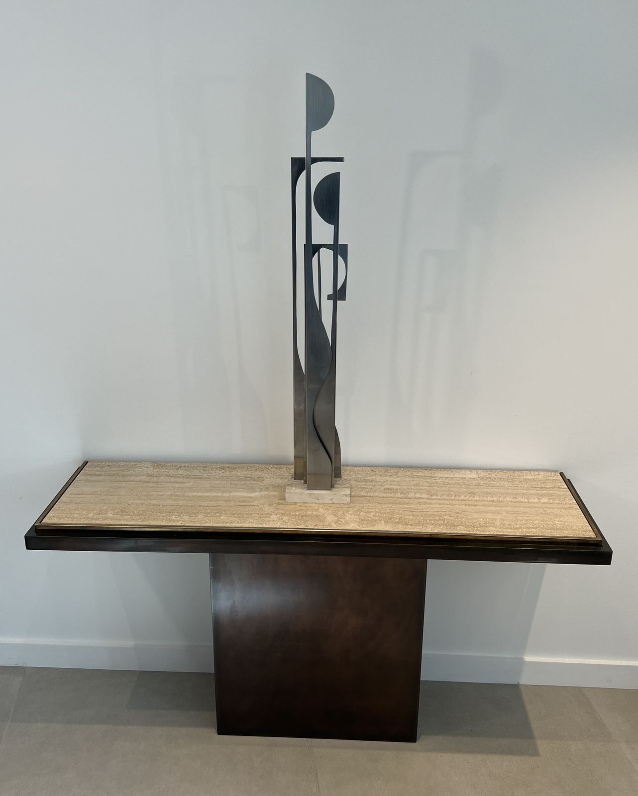 3250.0 Gunmetal Patina Console With Travertine Top. French Work. Circa 1970 photo