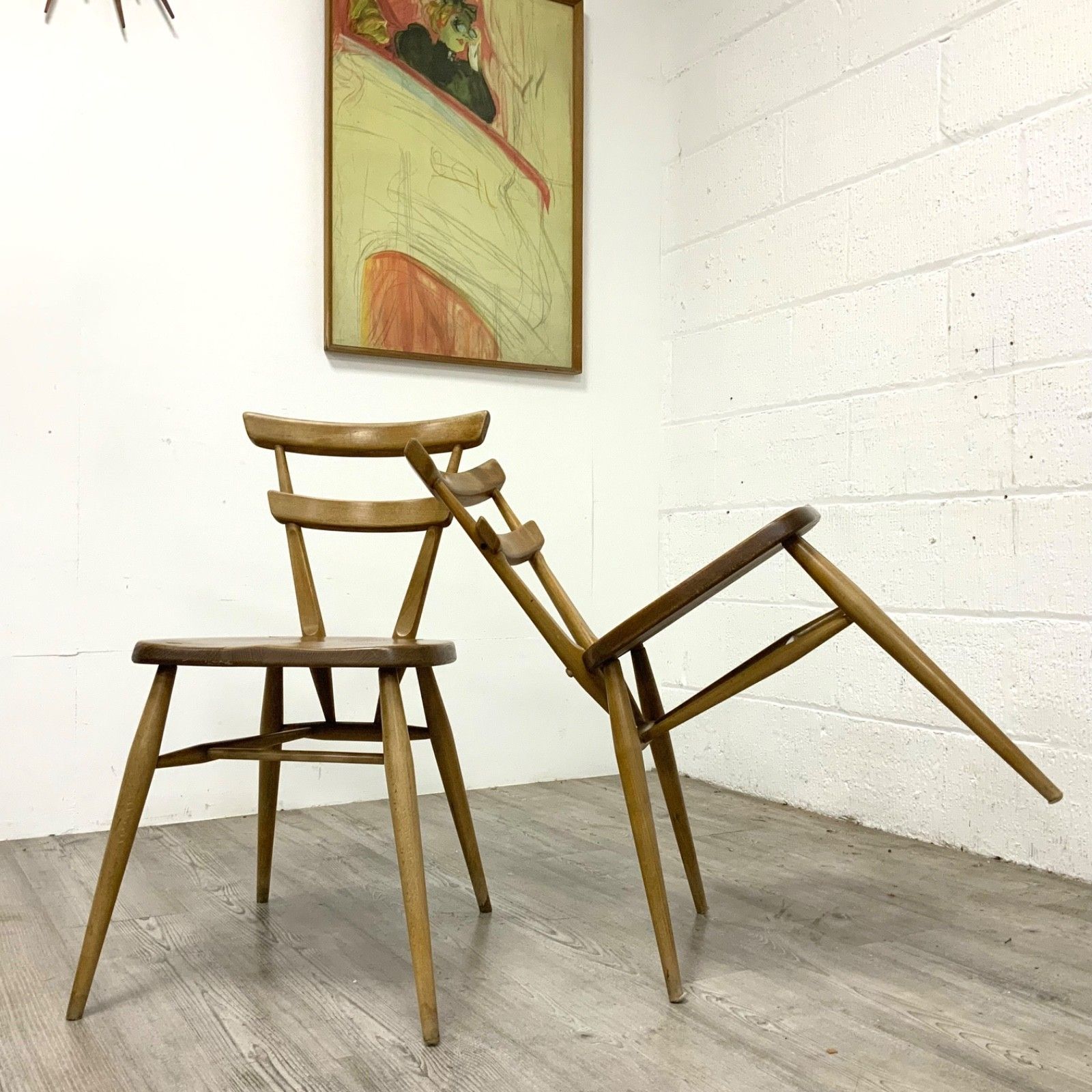 A Pair Of Ercol Model 461 “Green Dot” Adult Size Stacking Chairs 1960
